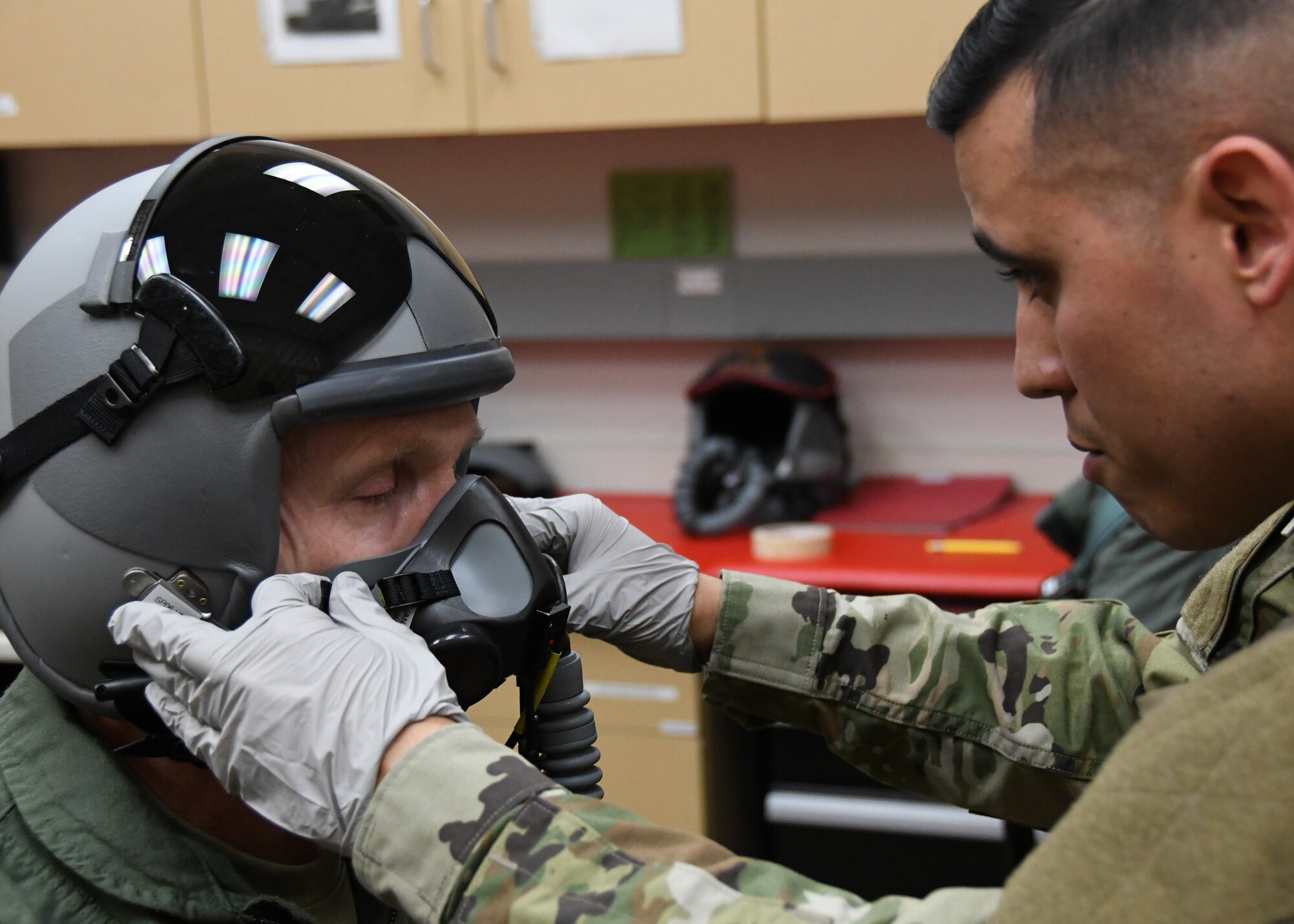 Maj. Gen. Jay D. Jensen, Headquarters Air Force Reserve Command, director of plans, programs and requirements, receives emergency parachute training at the 414th Combat Training Squadron, prior to his familiarization flight, Jan. 9, 2020, at Nellis Air Force Base, Nevada. (U.S. Air Force photo by Natalie Stanley)