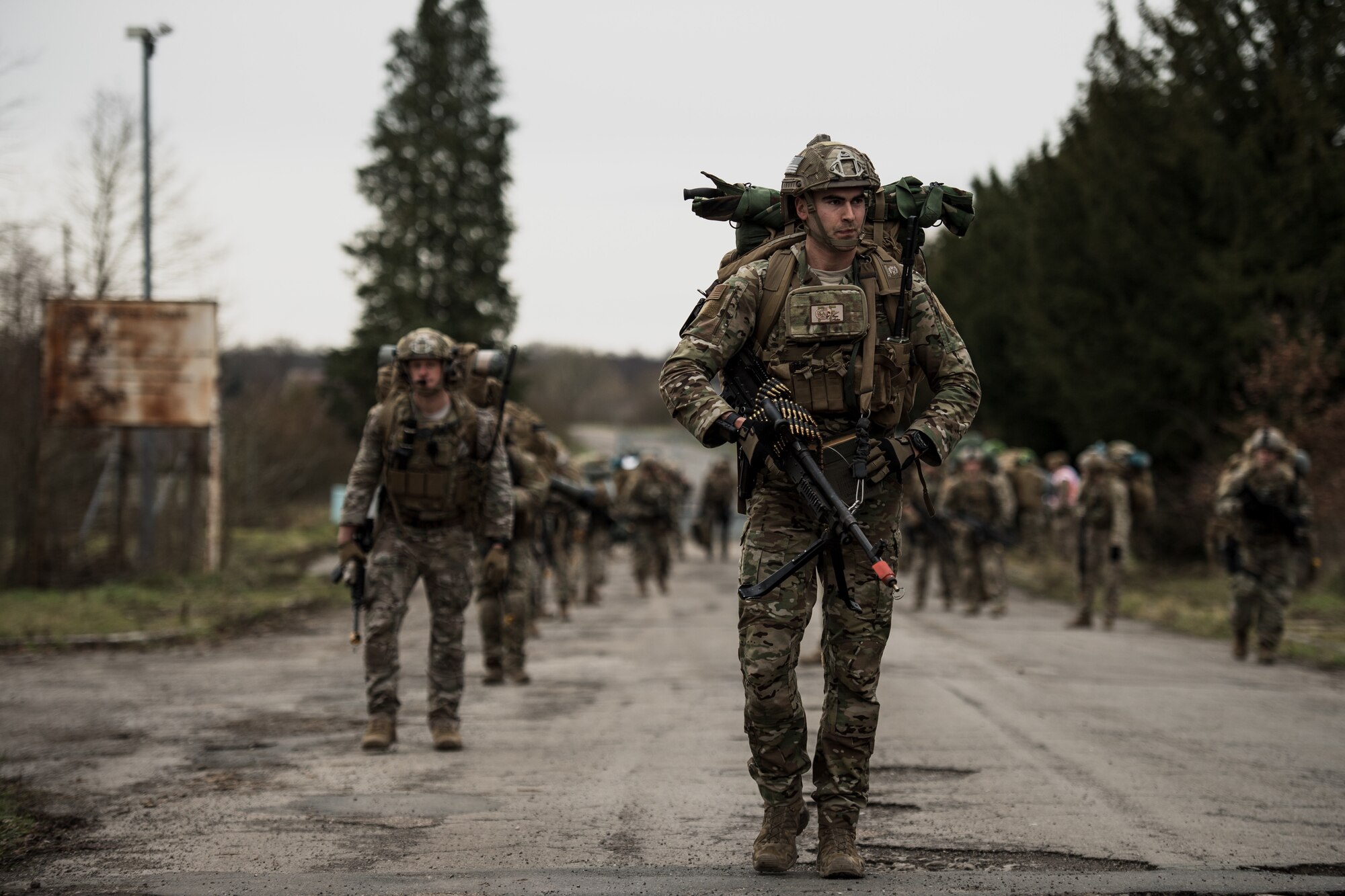 U.S. Air Force Staff Sgt. Quintan Ortega, 435th Security Forces Squadron contingency response fire-team leader, leads a squad to a rally point during exercise Frozen Defender in Grostenquin, France, Jan. 14, 2020. Frozen Defender tests the squadron’s capabilities in a contested environment under harsh conditions. The training location is among several sites which are shared between the U.S., French and German air forces. (U.S. Air Force photo by Staff Sgt. Devin Boyer)