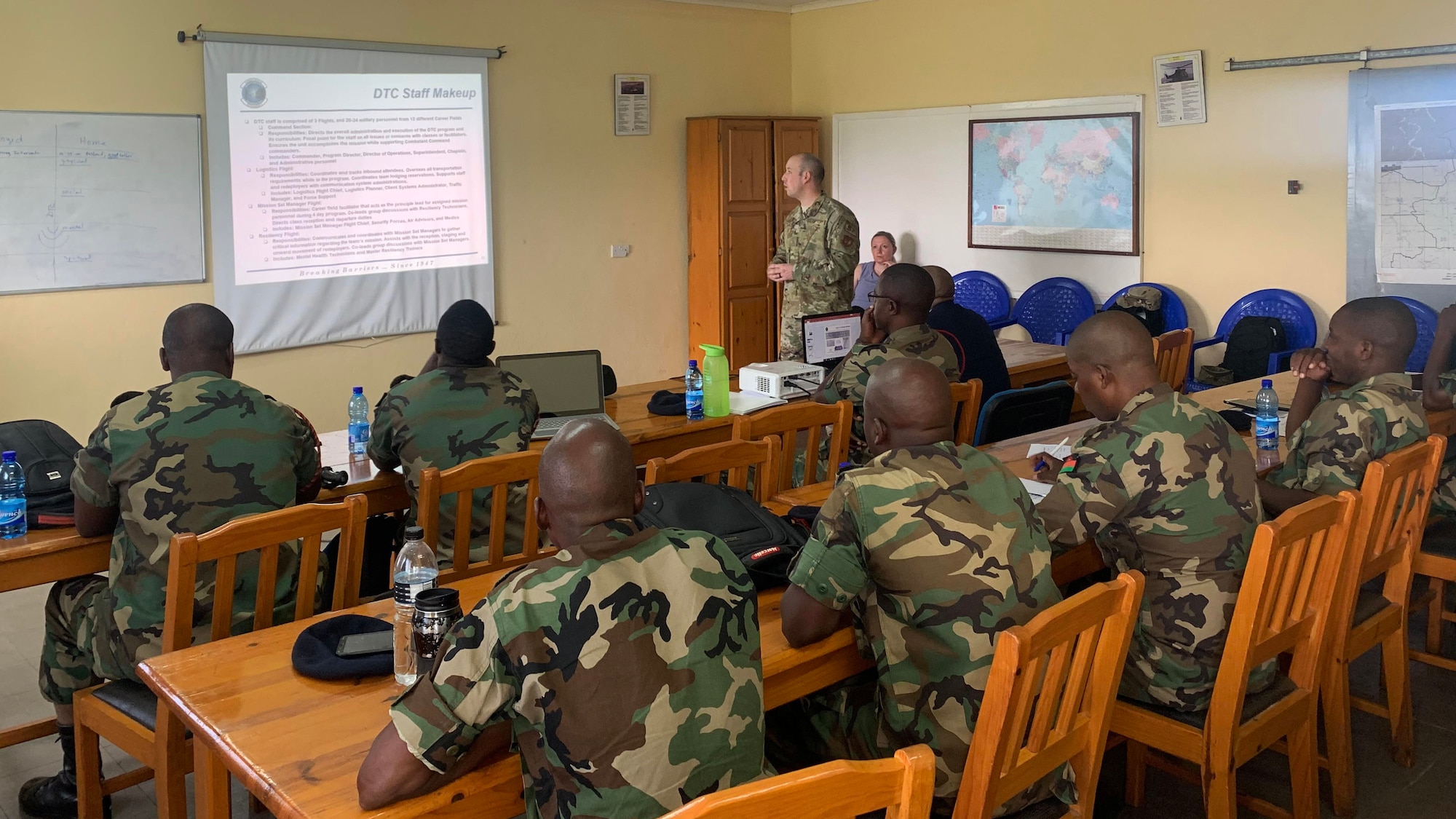 MSgt. Brandon Owens, superintendent, 86th Mission Support Group Detachment 1, Air Force Deployment Transition Center, briefs members of the Malawian air force on the U.S. Air Force’s sole third location decompression program at Lilongwe Air Base, Malawi, Jan. 16, 2020. Rodriguez went to Malawi in support of the USAFE-AFAFRICA force development team that has been working with the Malawian air force since 2018 to build partnership capability in the region. (U.S. Air Force photo by Capt. Korey Fratini)