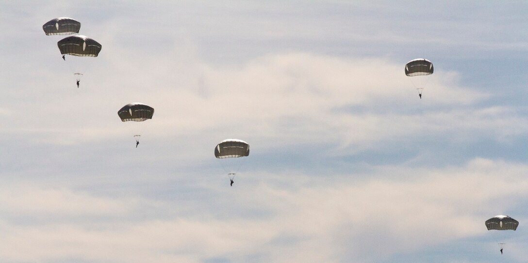 Paratroopers from the 82nd Airborne Division make their decent onto Sicily Drop Zone.