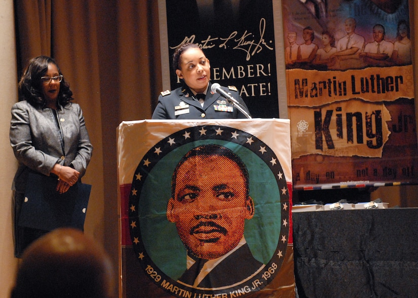 Maj. Lakisha Earl-Hale, G-1 chief of plans for the U.S. Army Reserve’s 99th Readiness Division, delivers remarks during New Jersey’s annual Martin Luther King Jr. commemoration Jan. 19 at the N.J. State Museum Auditorium in Trenton. Honored during the ceremony was former Sgt. Hilda P. Griggs, who served in the Second World War’s 6888th Central Postal Directory Battalion. The 6888th was the first-and-only all-African American, all-female unit to deploy overseas during the war. It consisted of 855 women under the command of Lt. Charity Adams, the first African-American woman commissioned in the Women’s Army Corps. (U.S. Army photo by Sgt. Sal Ottaviano)
