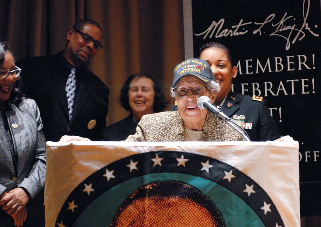 Former Sgt. Hilda P. Griggs, who served in the Second World War’s 6888th Central Postal Directory Battalion, delivers remarks during New Jersey’s annual Martin Luther King Jr. commemoration Jan. 19 at the N.J. State Museum Auditorium in Trenton. The 6888th was the first-and-only all-African American, all-female unit to deploy overseas during the war. It consisted of 855 women under the command of Lt. Charity Adams, the first African-American woman commissioned in the Women’s Army Corps. (U.S. Army photo by Sgt. Sal Ottaviano)