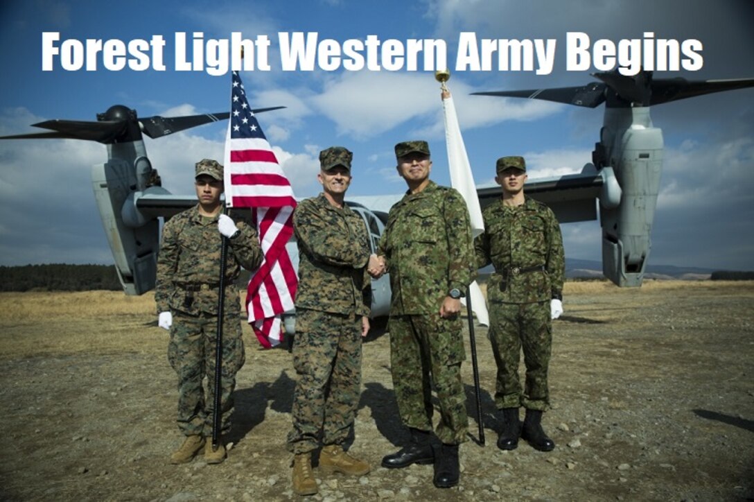 Col. Robert Brodie, left, commanding officer of the 31st Marine Expeditionary Unit, stands with Japan Ground Self-Defense Force Col. Kouki Watanabe, commanding officer of the JGSDF 12th Infantry Regiment after the opening ceremony for Exercise Forest Light Western Army at Camp Oyanohara, Kyushu, Japan, Jan. 18, 2020. The exercise will consist of field training events including basic infantry skills, vertical assaults integrated with MV-22B Osprey flight operations, and combined–arms, and enhances the collective defense capabilities of the U.S.-Japanese alliance. The 31st MEU, the Marine Corps’ only continuously forward deployed MEU, provides a flexible and lethal force ready to perform a wide range of military operations as the premier crisis response force in the Indo-Pacific region. (Official Marine Corps photo by Sgt. Audrey M. C. Rampton)