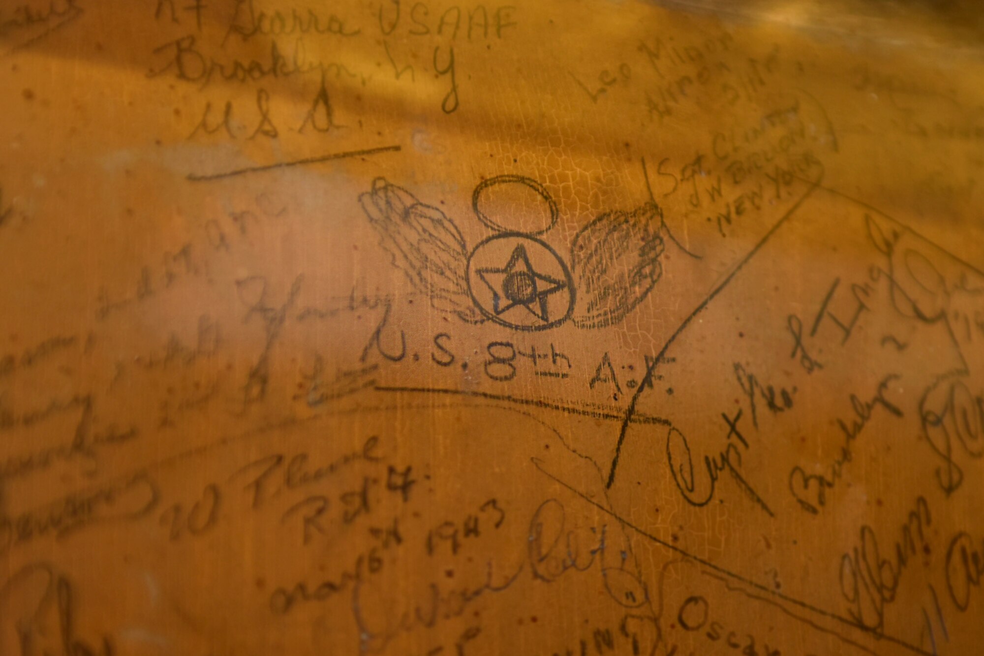 A wall with 233 signatures of the U.S. military service members that died in World War II is on display at the Swan Hotel, Lavenham England, Jan. 20, 2020. The 487th Bombardment Group, U.S. Army Air Forces, arrived in Lavenham in April 1944 and stayed until Nov. 1945. (U.S. Air Force photo by Airman 1st Class Madeline Herzog)