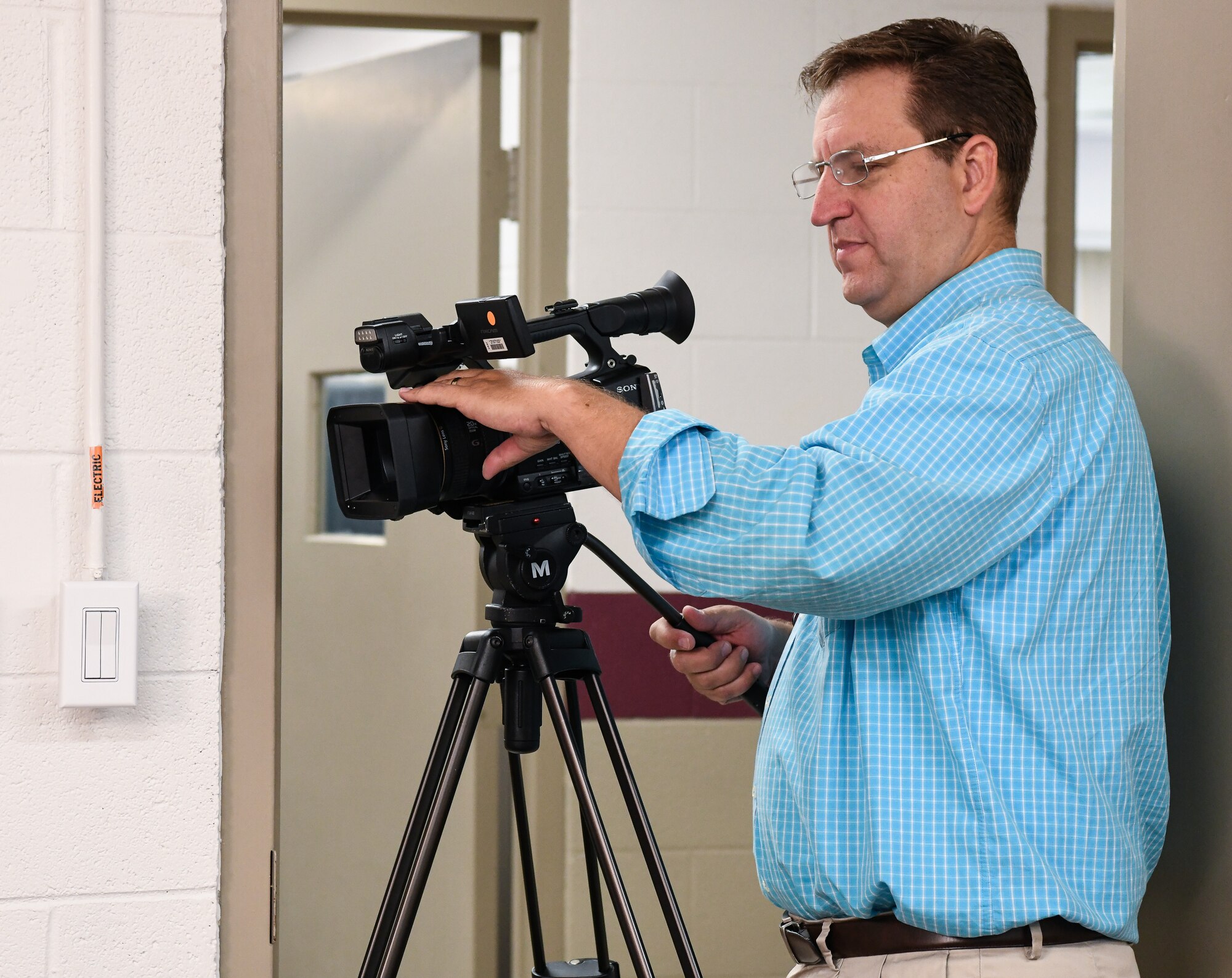 David Wright, who works in Public Affairs, shoots video at Arnold Air Force Base. (U.S. Air Force photo by Jill Pickett)