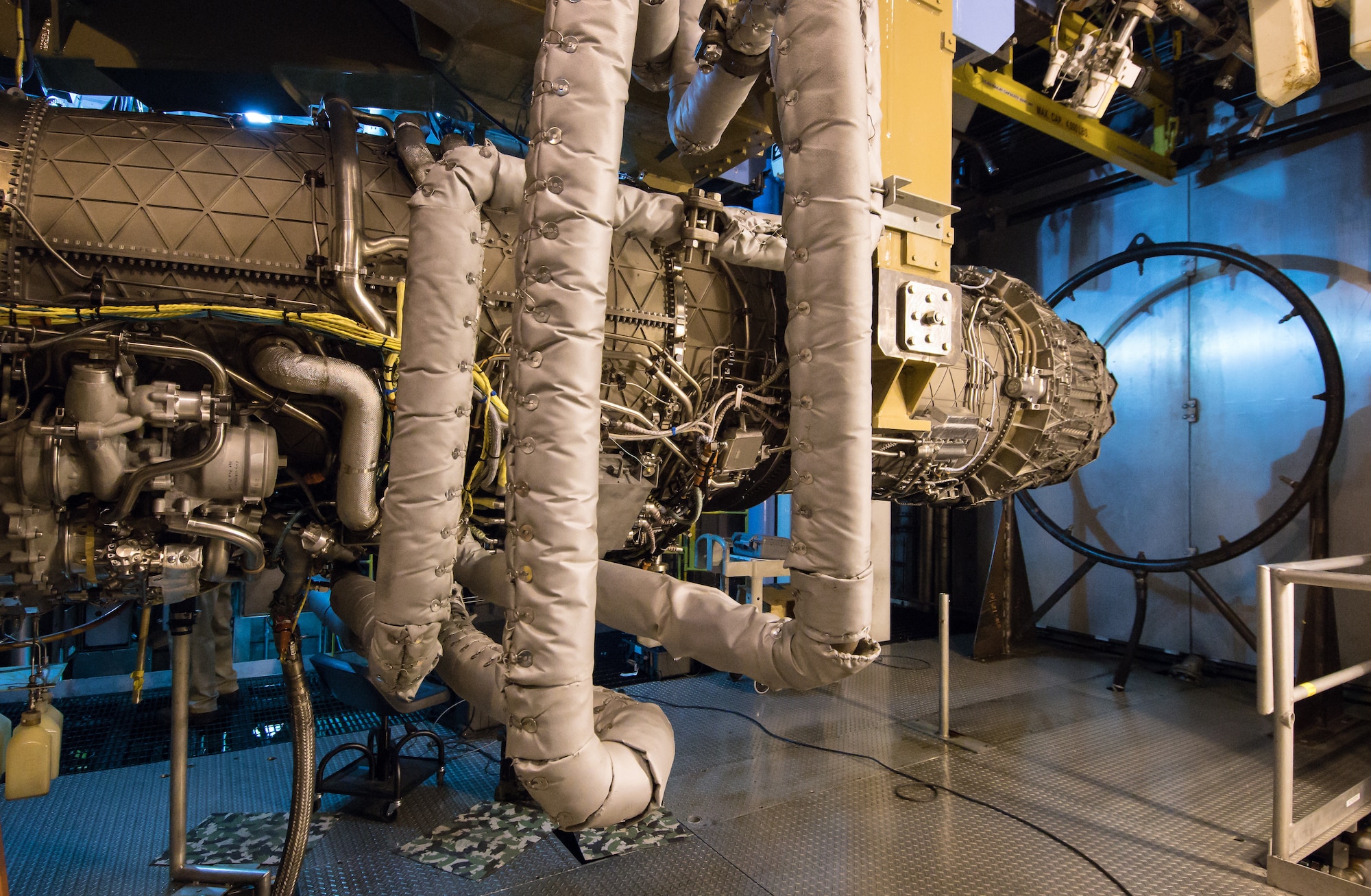 An F135 engine sits in an Arnold Engineering Development Complex (AEDC) Engine Test Facility (ETF) test cell at Arnold Air Force Base, Tennessee between test runs. The F135 is undergoing Accelerated Mission Testing in the AEDC facility and is used to power the F-35 Joint Strike Fighter Lightning II. (U.S. Air Force photo by Jill Pickett)