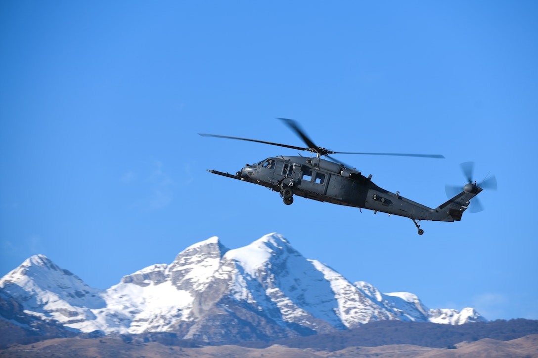 An U.S. Air Force HH-60G Pave Hawk helicopter maintained by the 56th Helicopter Maintenance Unit circles around the Italian Dolomites at Aviano Air Base, Italy, Jan. 21, 2020. The HH-60G rescue equipment includes a hoist capable of lifting a 600-pound load from a hover height of 200 feet, and a personnel locating system that is compatible with the PRC-112 survival radio and provides range and bearing information to a survivor's location. (U.S. Air Force photo by Airman 1st Class Ericka A. Woolever).