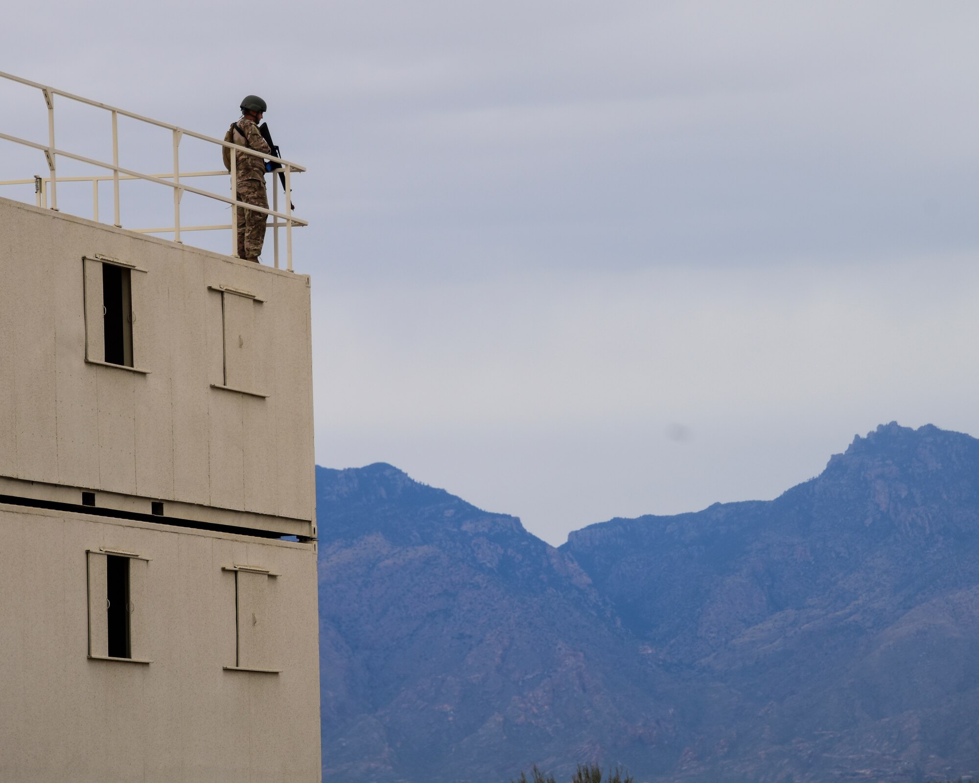 Airman stands guard during training exercise