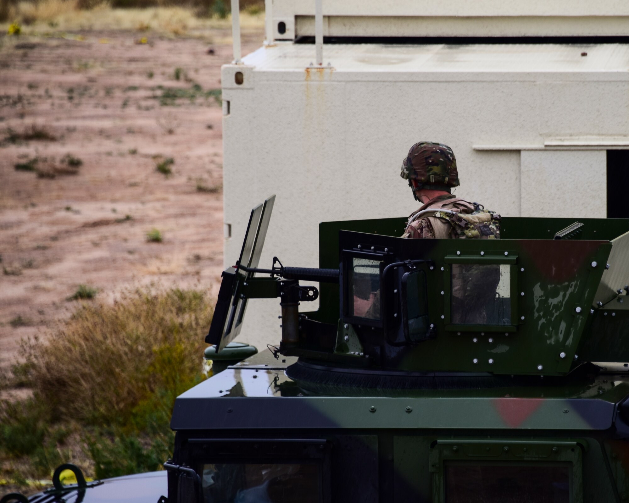 Airman runs patrol in a Humvee
