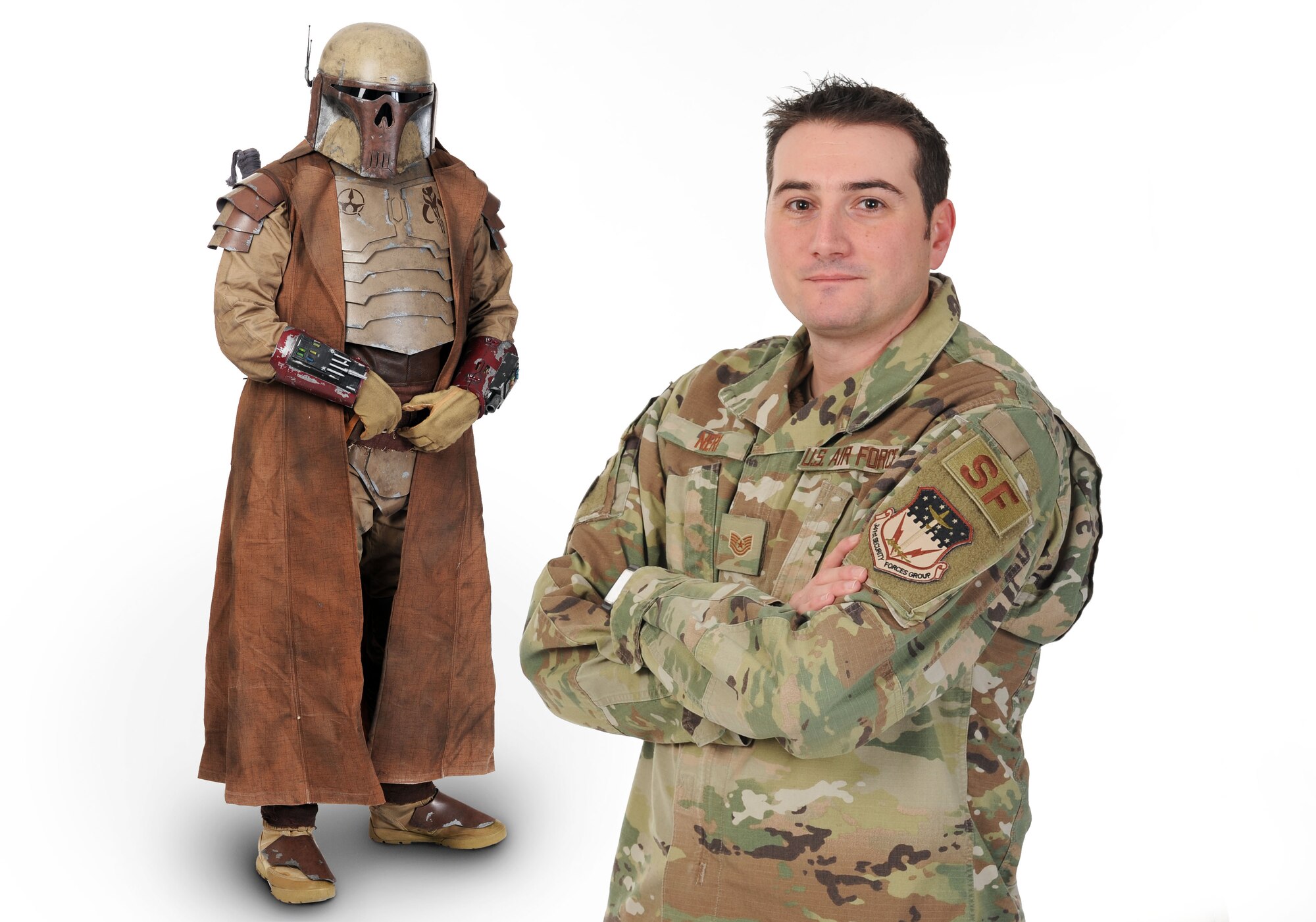 Tech. Sgt. Sean Neri, 341st Security Forces Support Squadron vehicle readiness center NCO-in charge, poses in his custom-made Mandalorian suit and in his Air Force uniform Jan. 15, 2020, at Malmstrom Air Force Base, Mont.