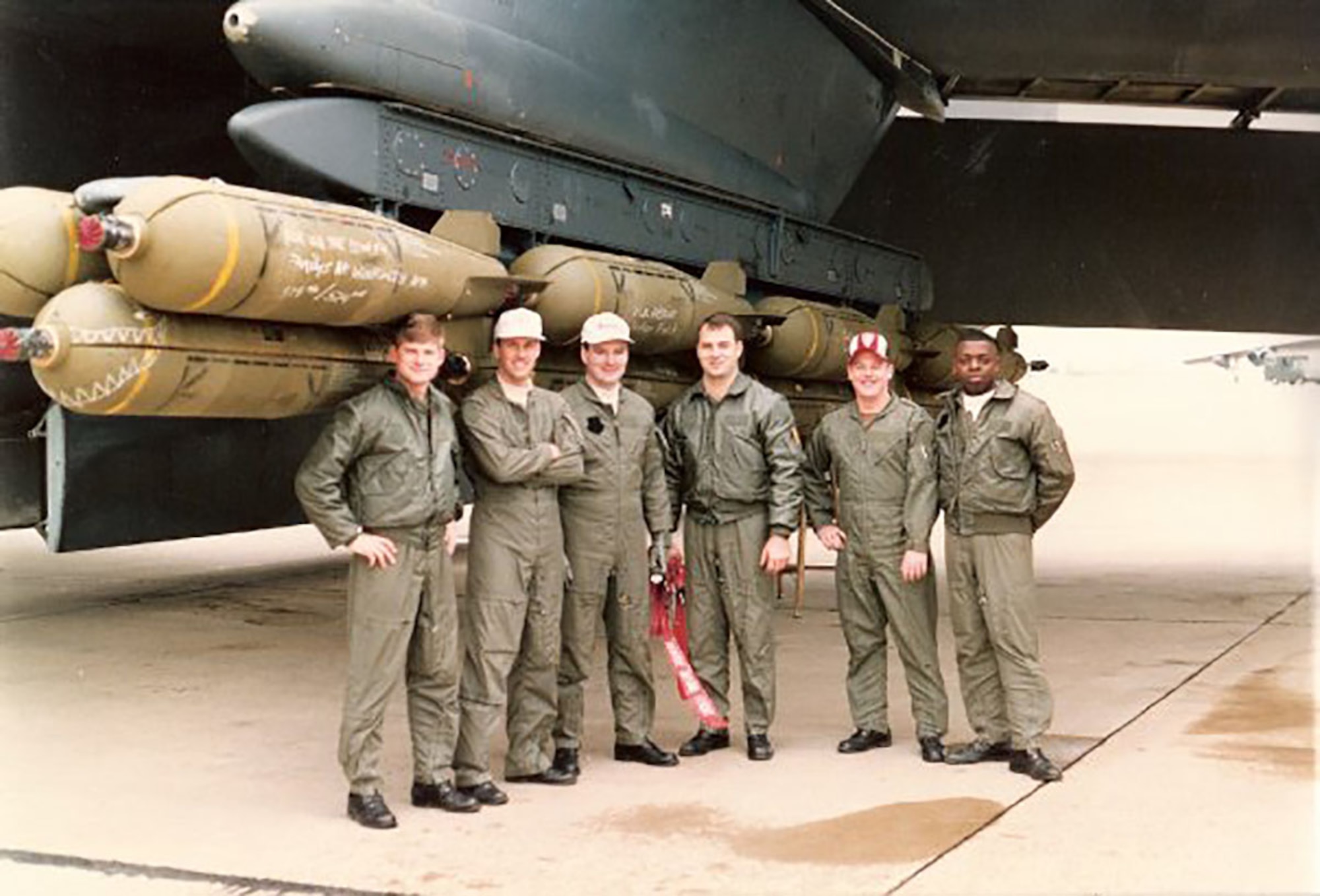 Airmen pose outside a B-52 back in 1991.