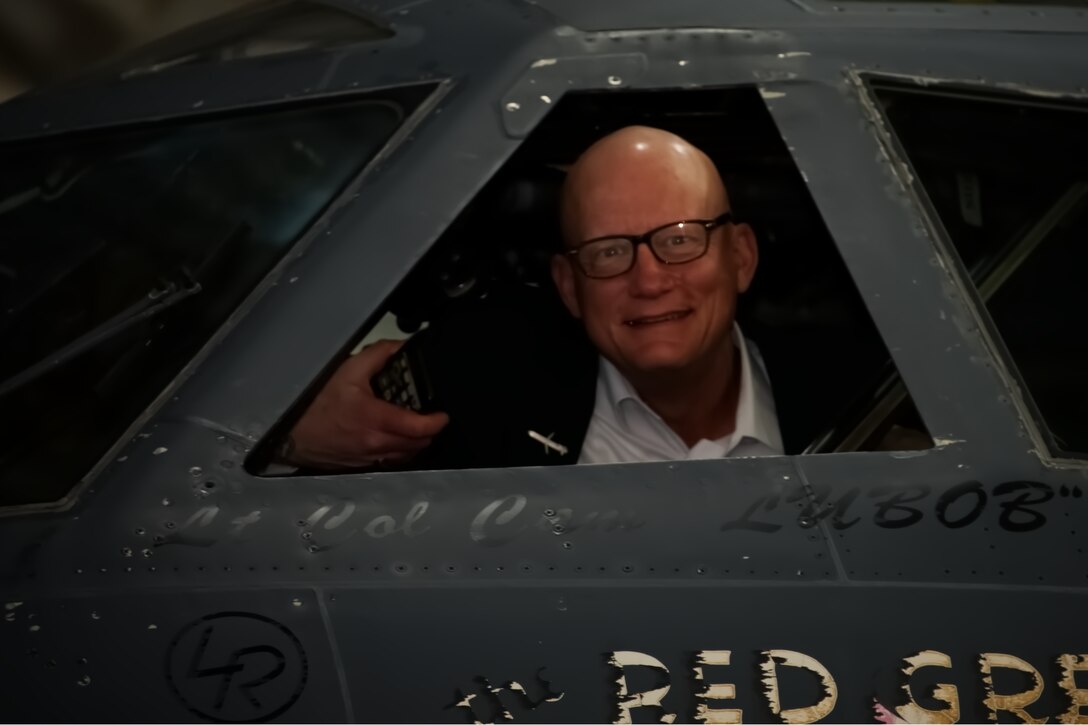 Warren Ward looking through window of B-52