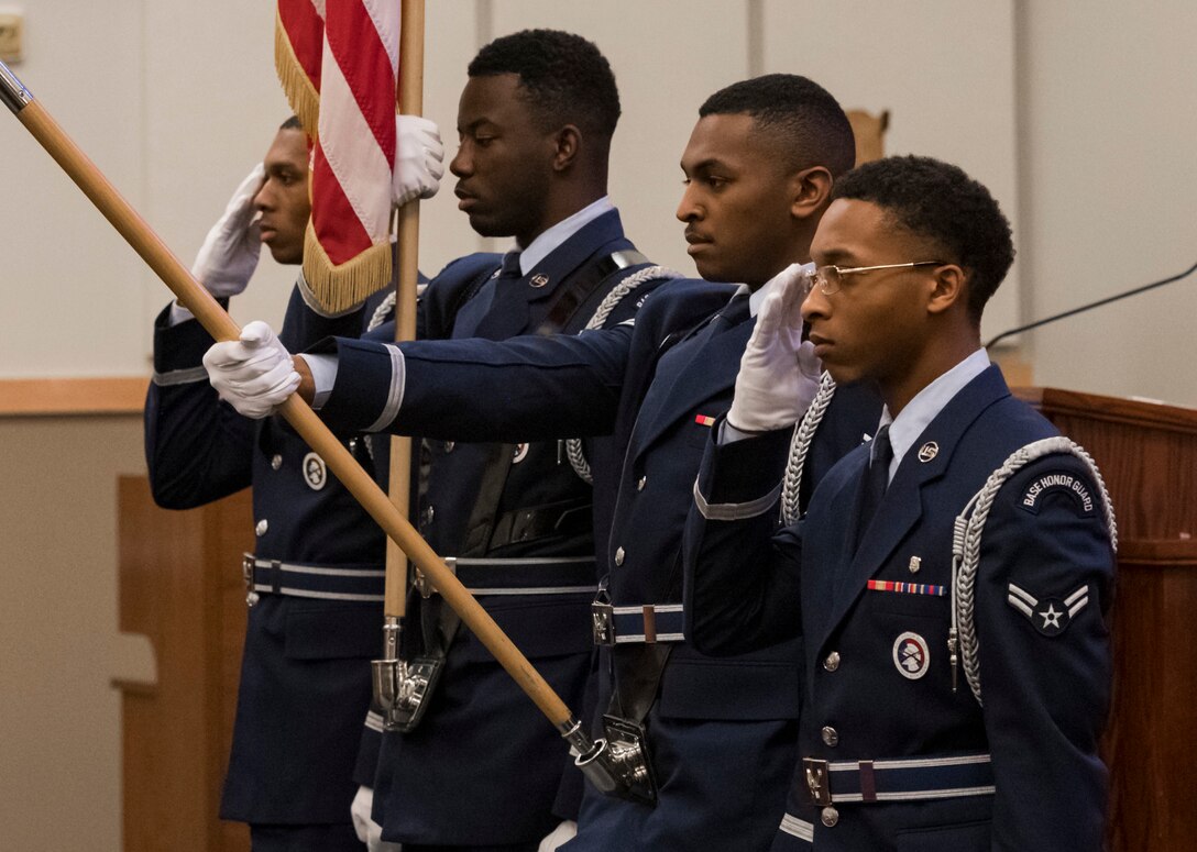 The Dover Air Force Base Honor Guard presents the colors during a tribute to Dr. Martin Luther King Jr. Jan. 14, 2020, at the chapel on Dover AFB, Del. King was the youngest man to receive the Nobel Peace Prize in 1964, at age 35. After his selection, he announced the prize money of $54,123 would be donated to the furtherance of the civil rights movement. (U.S. Air Force photo by Airman 1st Class Danielle Taylor)