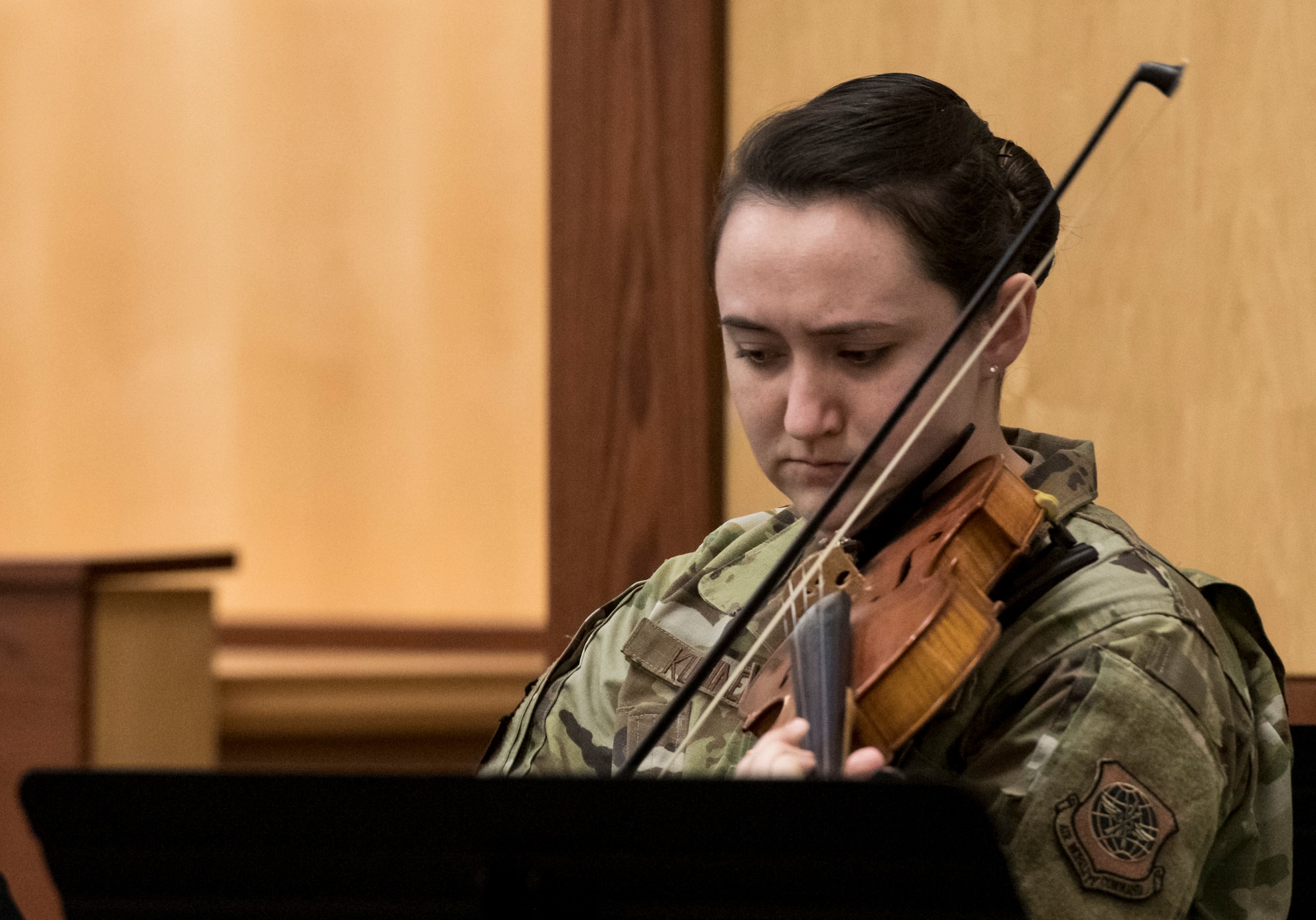 Staff Sgt. Emily Kuusinen, 436th Logistics Readiness Squadron, plays the national anthem during a tribute to Dr. Martin Luther King Jr. Jan. 14, 2020, at the chapel on Dover Air Force Base, Del. King delivered his famous “I have a Dream” speech to approximately 250,000 people Aug. 28, 1963, in Washington, D.C. He also delivered more than 2,500 other speeches, wrote five books and published several articles. (U.S. Air Force photo by Airman 1st Class Danielle Taylor)
