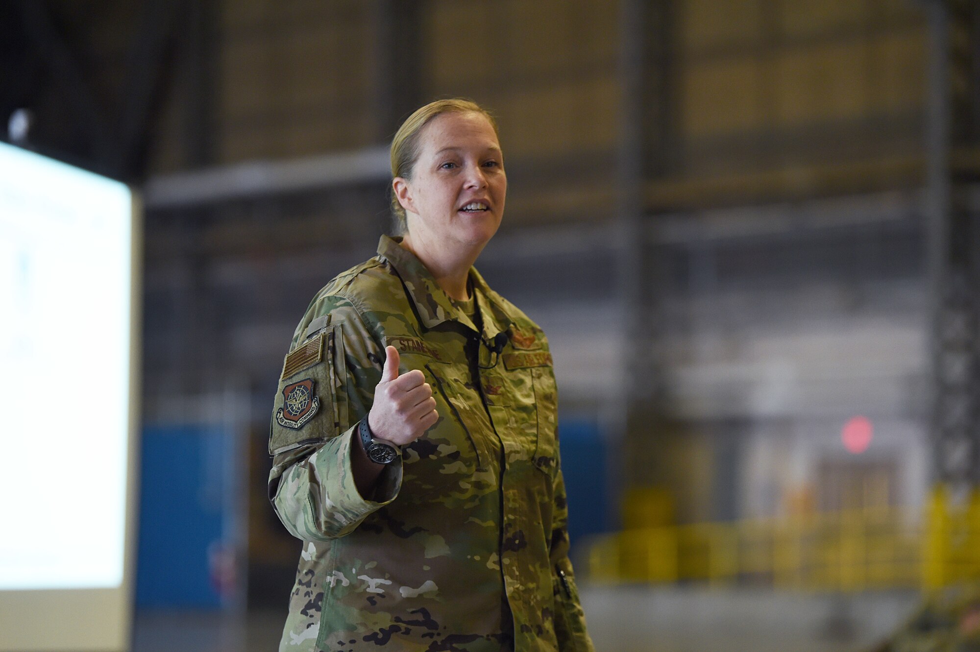 Col. Erin Staine-Pyne, 62nd Airlift Wing commander, speaks to members of the wing during a commander’s call Jan. 16, 2020 at Joint Base Lewis-McChord, Wash. One of her top priorities as commander is making sure Airmen are restoring readiness to win any fight at any time. (U.S. Air Force photo by Airman 1st Class Mikayla Heineck)