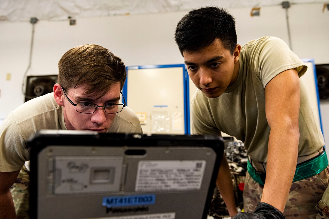 Title
Airman 1st Class Jonathan Flores, right, 41st Helicopter Maintenance Unit apprentice, and Staff Sgt. Leon Blomeley, 41st HMU craftsman, examine technical orders during a gearbox seal replacement on a spare HH-60G Pave Hawk engine Jan. 15, 2020, at Moody Air Force Base, Georgia. These repairs are performed to increase spare-part availability of HH-60G engines. This allows the 41st HMU to swiftly return aircraft to mission-capable status without delay. (U.S. Air Force photo by Senior Airman Erick Requadt)