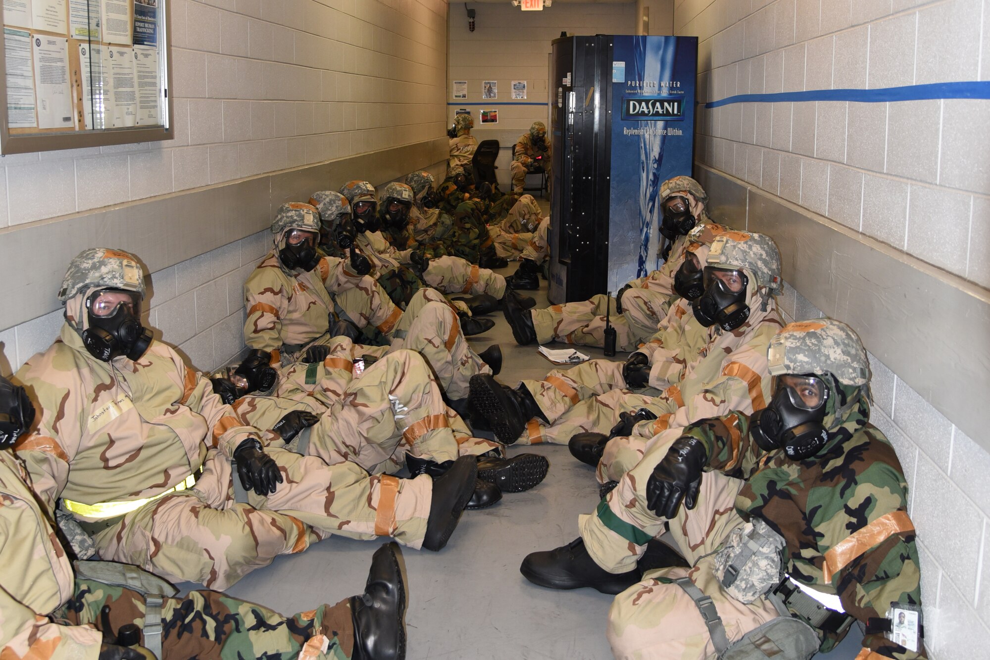 Reserve Citizen Airmen from the 403rd Wing wait for the "all clear" after a simulated attack, putting their military training to the test during an enhanced training exercise called Operation Southern Comfort Jan 13-16, 2020, which took place at the Mississippi National Guard Combat Readiness Training Center, Gulfport, Mississippi and Camp Shelby, Hattiesburg, Mississippi. This training exercise was created with the intent to observe these Airmen perform their job duties in a simulated wartime environment. The Airmen were given tasks that they may encounter to include simulated chemical attacks, threats, air and ground attacks. These "attacks" were designed to see how they react, if they react correctly and how long it takes to react; which determines if they received the proper training and that they understand the training. (U.S. Air Force photo by Master Sgt. Jessica Kendziorek)