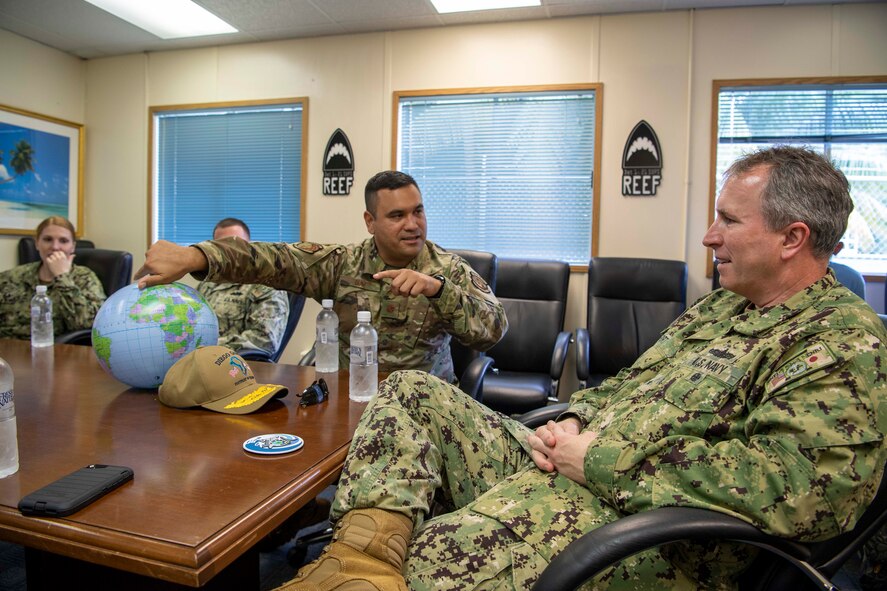 DIEGO GARCIA, British Indian Ocean Territory - Maj. Jesse Diaz, 21st Space Operations Squadron Detachment 1 commander, explains how the Air Force Satellite Control Network works to Rear Adm. Brian Fort, U.S. Naval Forces Japan and Navy Region Japan commander, at the U.S. Navy Support Facility, Diego Garcia, Jan. 15, 2020. The 21st SOPS Det. 1 is a tenant unit at NSF Diego Garcia, conducts AFSCN operations, provides launch support as augmentation to the Western Range, manages global positioning system ground infrastructure and is the lead for 24/7 AFSCN cyber security scanning. (U.S. Navy photo by Mass Communication Specialist 3rd Class Dartanon Diego Delagarza)