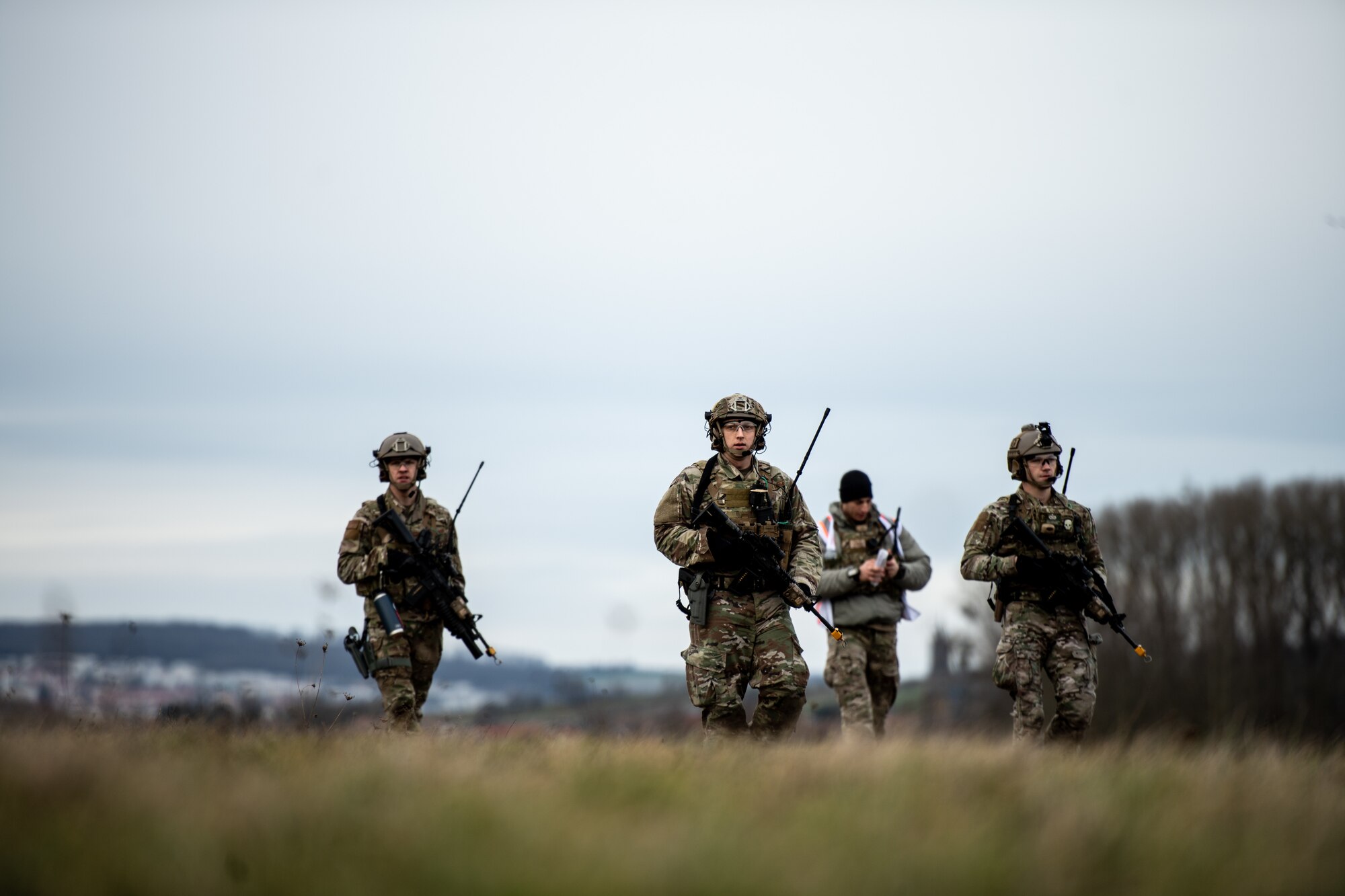 U.S. Air Force Defenders assigned to the 435th Security Forces Squadron perform sweeps on an airfield during exercise Frozen Defender in Grostenquin, France, Jan. 14, 2020. Frozen Defender tests the squadron’s capabilities in a contested environment under harsh conditions. The fireteam conducted the sweeps after receiving simulated intelligence, surveillance, and reconnaissance on threats in the area. (U.S. Air Force photo by Staff Sgt. Devin Boyer)