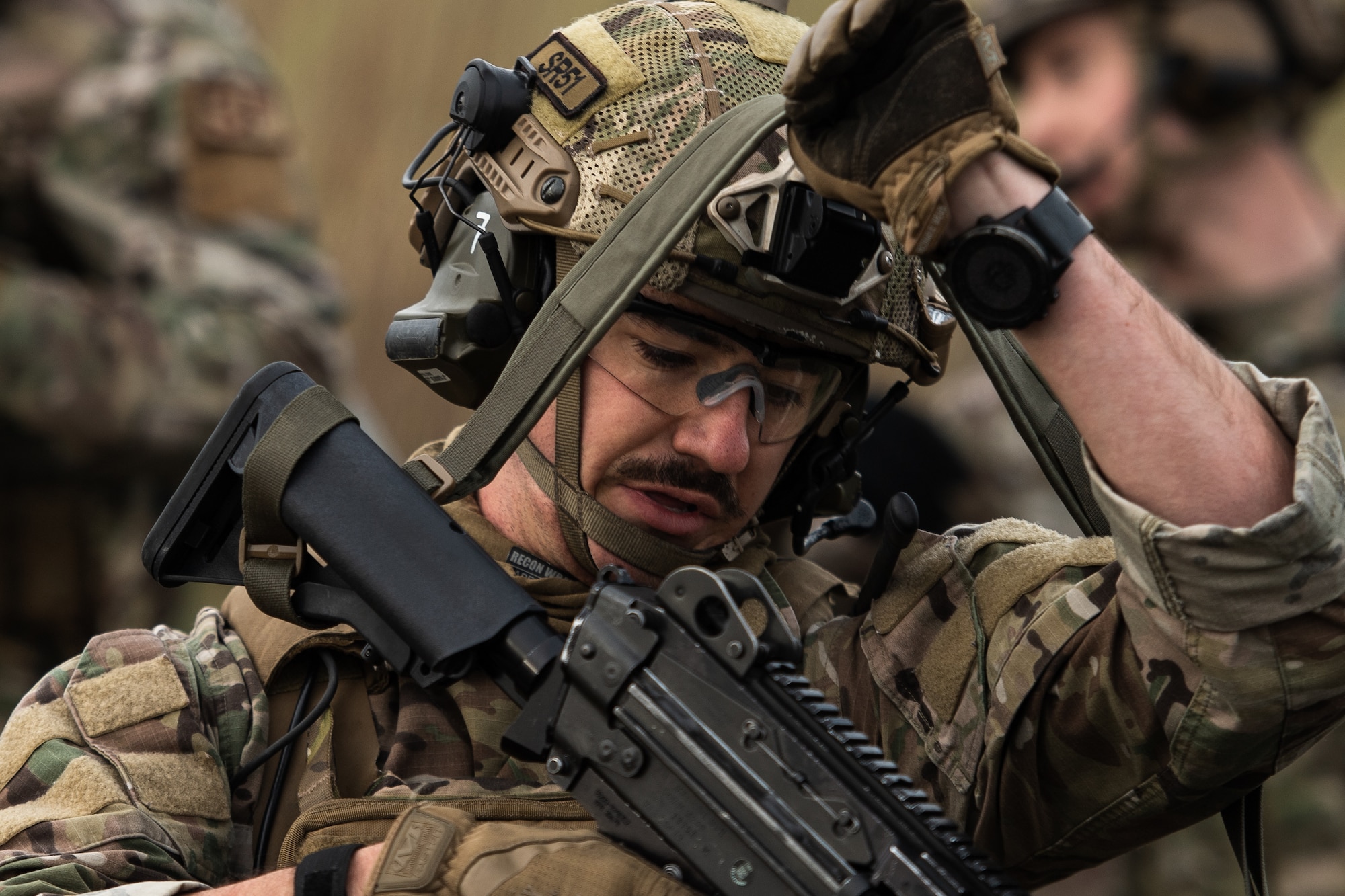 U.S. Air Force Staff Sgt. Dwight Stalter, 435th Security Forces Squadron contingency response team leader, slings his rifle over his shoulder during exercise Frozen Defender in Grostenquin, France, Jan. 14, 2020. Frozen Defender tests the squadron’s capabilities in a contested environment under harsh conditions. The Defenders maintained vigilance as they faced adversarial encounters throughout the exercise. (U.S. Air Force photo by Staff Sgt. Devin Boyer)