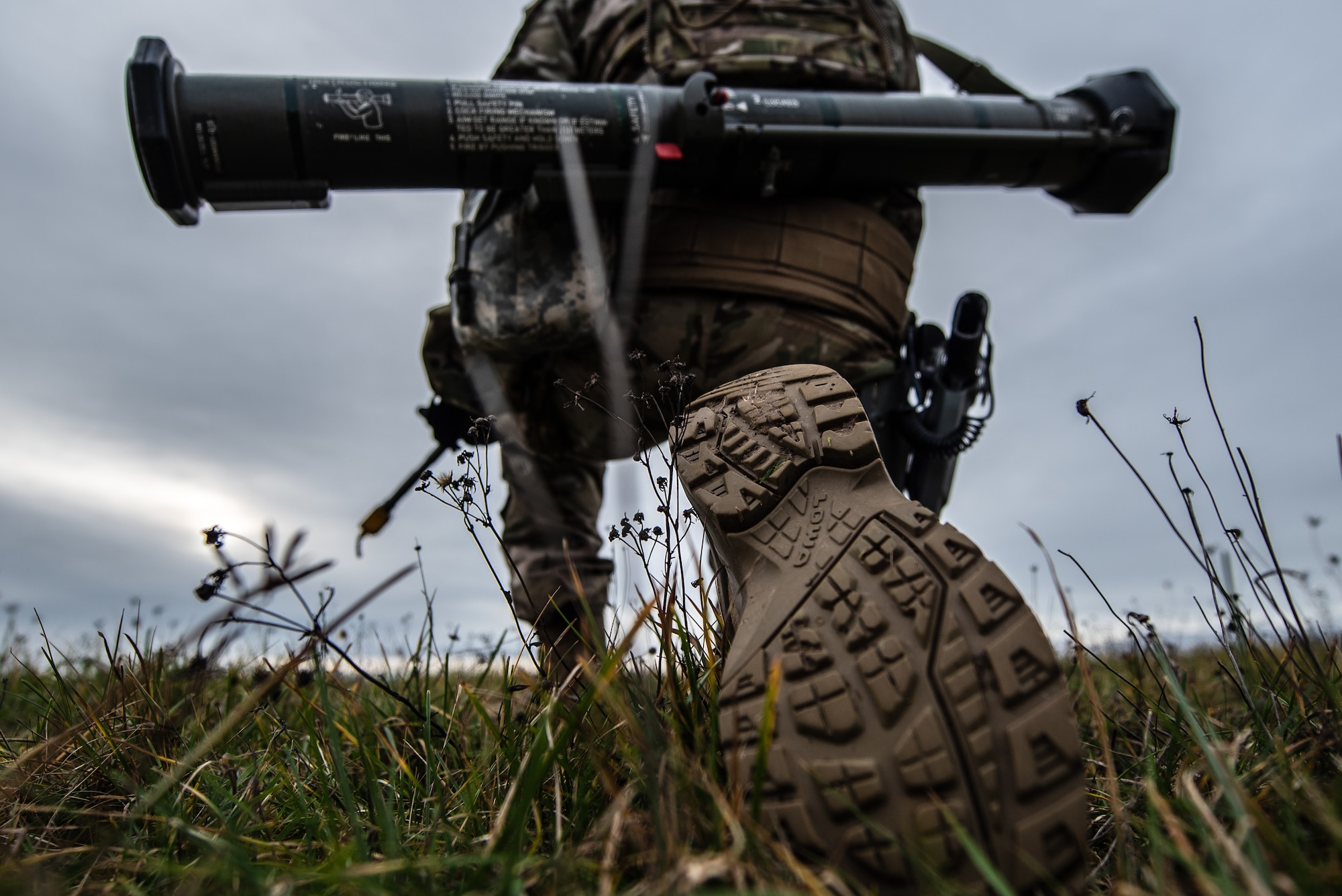 U.S. Air Force Staff Sgt. Esteban Goniwicha, 435th Security Forces Squadron ground combat readiness training center instructor, provides security on an airfield during exercise Frozen Defender in Grostenquin, France, Jan. 14, 2020. Frozen Defender tests the squadron’s capabilities in a contested environment under harsh conditions. Goniwicha and his comrades cleared the airfield of any simulated adversaries to enable air operations in the austere environment. (U.S. Air Force photo by Staff Sgt. Devin Boyer)