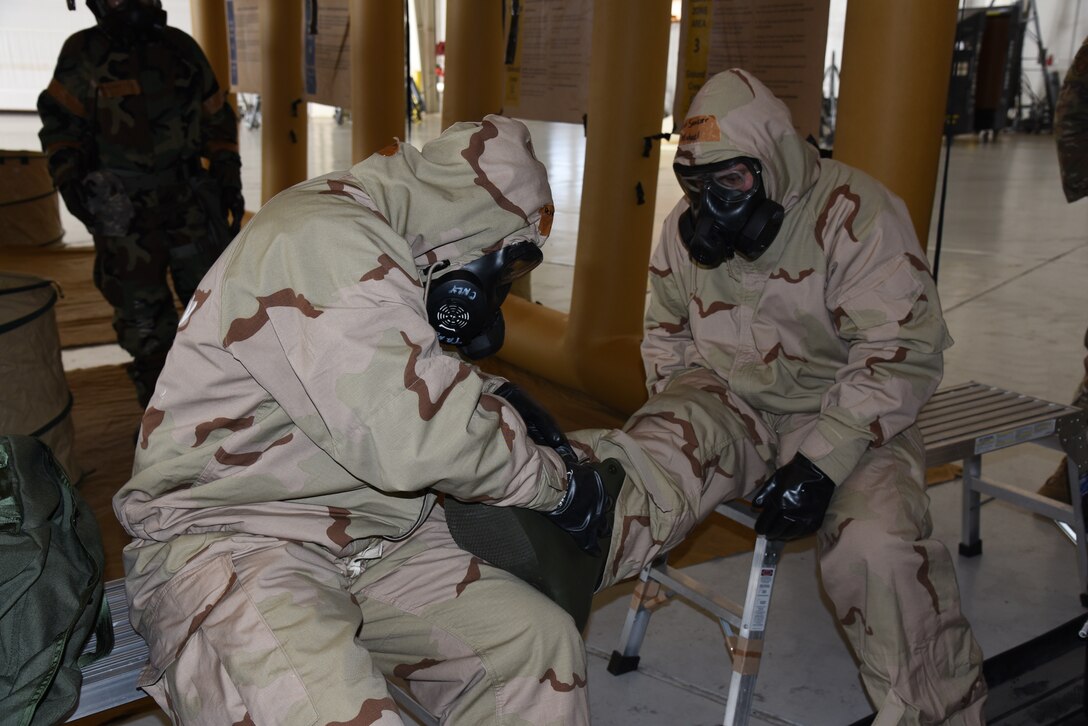 Reserve Citizen Airmen from the 403rd Wing go through the decontamination tent as part of their training during an enhanced training exercise called Operation Southern Comfort Jan 13-16, 2020, which took place at the Mississippi National Guard Combat Readiness Training Center, Gulfport, Mississippi and Camp Shelby, Hattiesburg, Mississippi. This training exercise was created with the intent to observe these Airmen perform their job duties in a simulated wartime environment. The Airmen were given tasks that they may encounter to include simulated chemical attacks, threats, air and ground attacks. These "attacks" were designed to see how they react, if they react correctly and how long it takes to react; which determines if they received the proper training and that they understand the training. (U.S. Air Force photo by Master Sgt. Jessica Kendziorek)