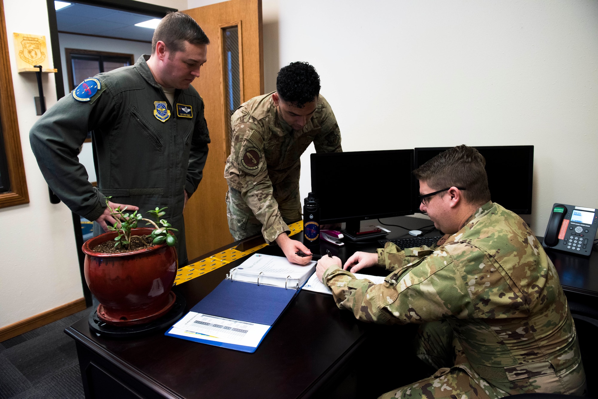 U.S. Air Force Lt. Col. Christopher Dieter, 97th Air Refueling Squadron director of operations, signs official orders of the first mission for the 97th ARS at Fairchild Air Force Base, Washington, Jan. 13, 2020. The 97th ARS’s first mission comes after its reactivation that took place October 2019 in order to support the addition of 12 new KC-135 Stratotankers and the estimated 1,000 Airmen and families being transferred to Fairchild. (U.S. Air Force photo by Senior Airman Lawrence Sena)