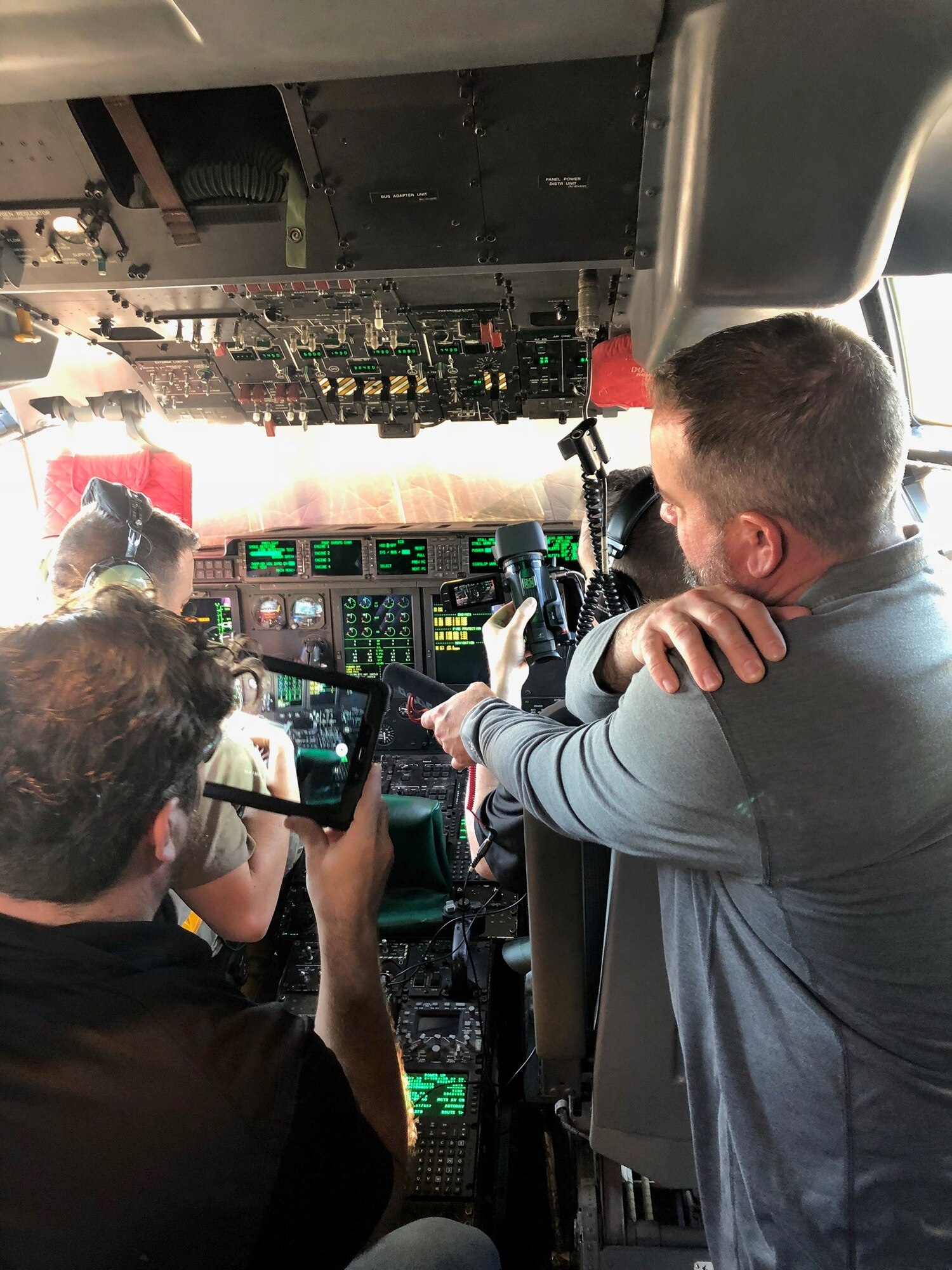 A Mass Virtual team member scan the flight deck of a C-130J Super Hercules to design a virtual reality environment to train C-130 maintainers.