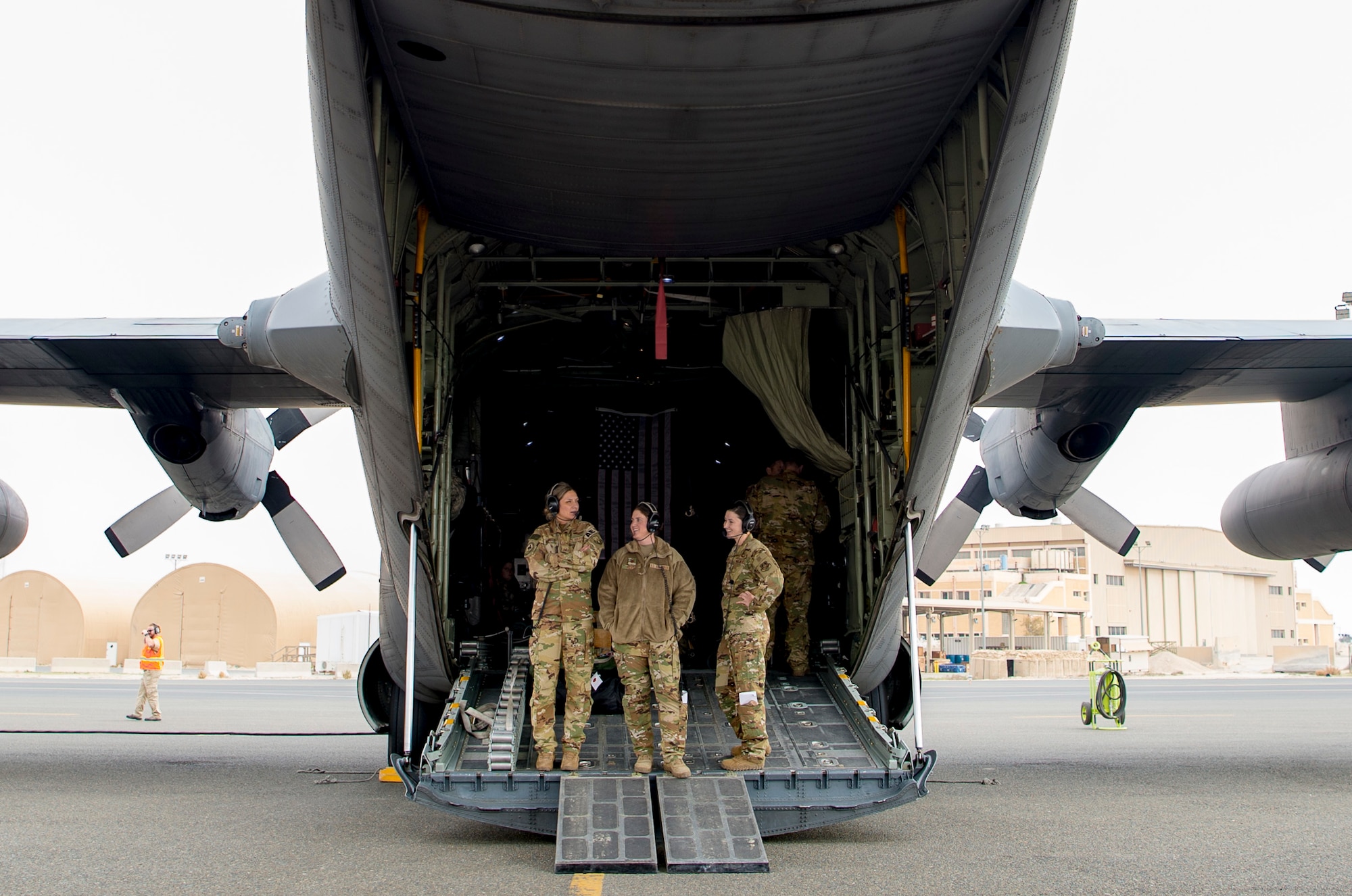 U.S. Air Force medical technicians assigned to the 379th Expeditionary Aeromedical Evacuation Squadron wait for patients to arrive during an aeromedical evacuation mission at an undisclosed location, Jan. 3, 2020.