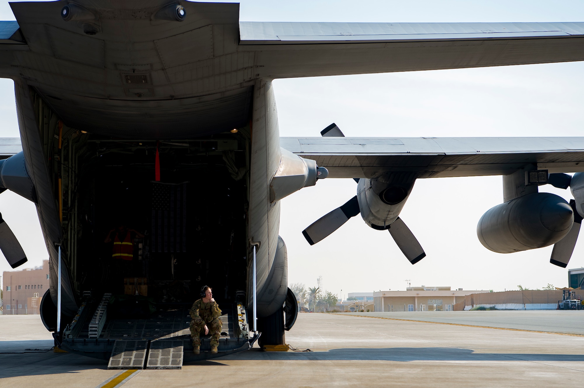 A U.S. Air Force medical technician assigned to the 379th Expeditionary Aeromedical Evacuation Squadron waits for patients to arrive during an aeromedical evacuation mission at an undisclosed location, Jan. 3, 2020.