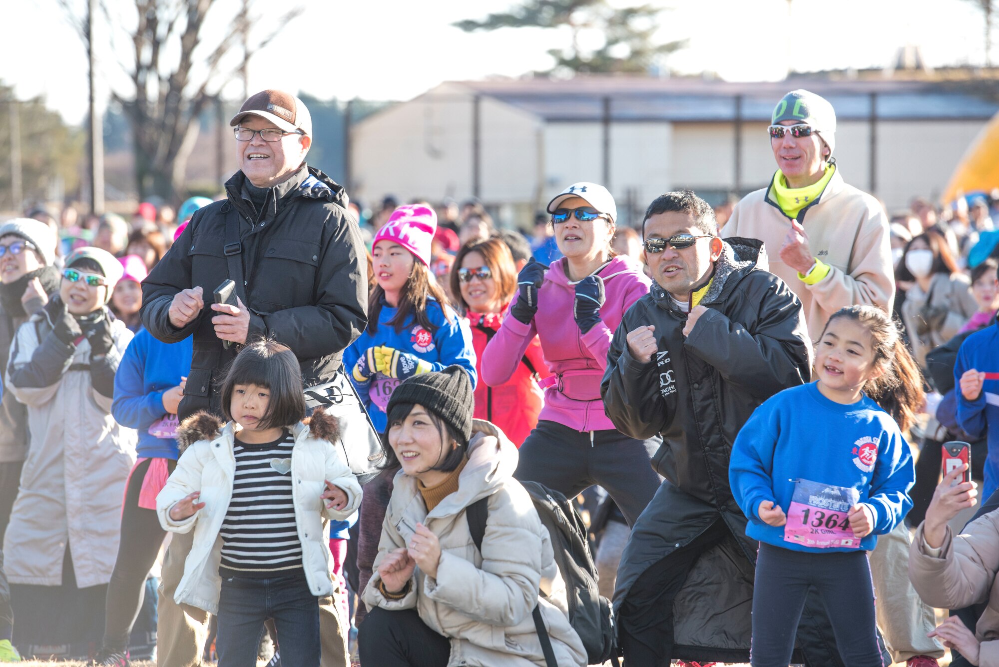 Participants do warm‐up exercises before the races start during the 39th Annual Frostbite Run, Jan.19, 2020, at Yokota Air Base, Japan.