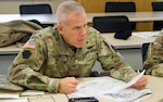 Col. Howard Lloyd, commander of the 28th Expeditionary Combat Aviation Brigade, networks with leaders from other units at the Northeast Regional Partnership Conference Jan. 15-16, 2020, at Fort Drum, N.Y. The purpose of the conference was to promote former Chief of Staff of the U.S. Army  Gen. Mark A. Milley’s vision of a total Army conference, where active-duty, National Guard and Reserve units all work together.