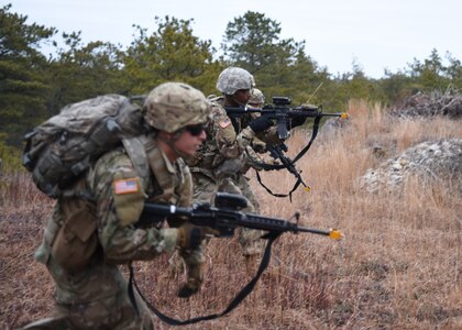 New York Army National Guard, B Company, 1st Battalion 69th Infantry, Soldiers, left to right, Spc. Artez Wilkins and Pfc. Steven Garcia Grenadier, both riflemen, practice taking out enemy targets during training at the 106th Rescue Wing, F.S. Gabreski Air National Guard Base in Westhampton Beach, N.Y., Jan., 11, 2020.