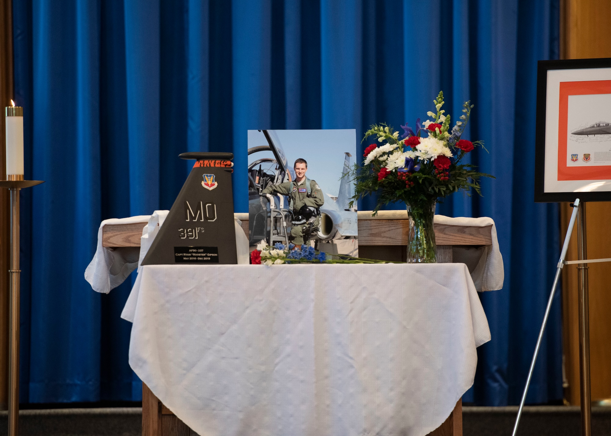 A table is set as a memorial for Capt. Ryan Gipson, 391st Fighter Squadron wing munitions manager, during his memorial ceremony,  Jan. 16, 2020, at Mountain Home Air Force Base, Idaho. This ceremony was held to celebrate the life of Capt. Ryan Gipson and his honorable years of service in the United States Air Force. (U.S. Air Force photo by Senior Airman Tyrell Hall)