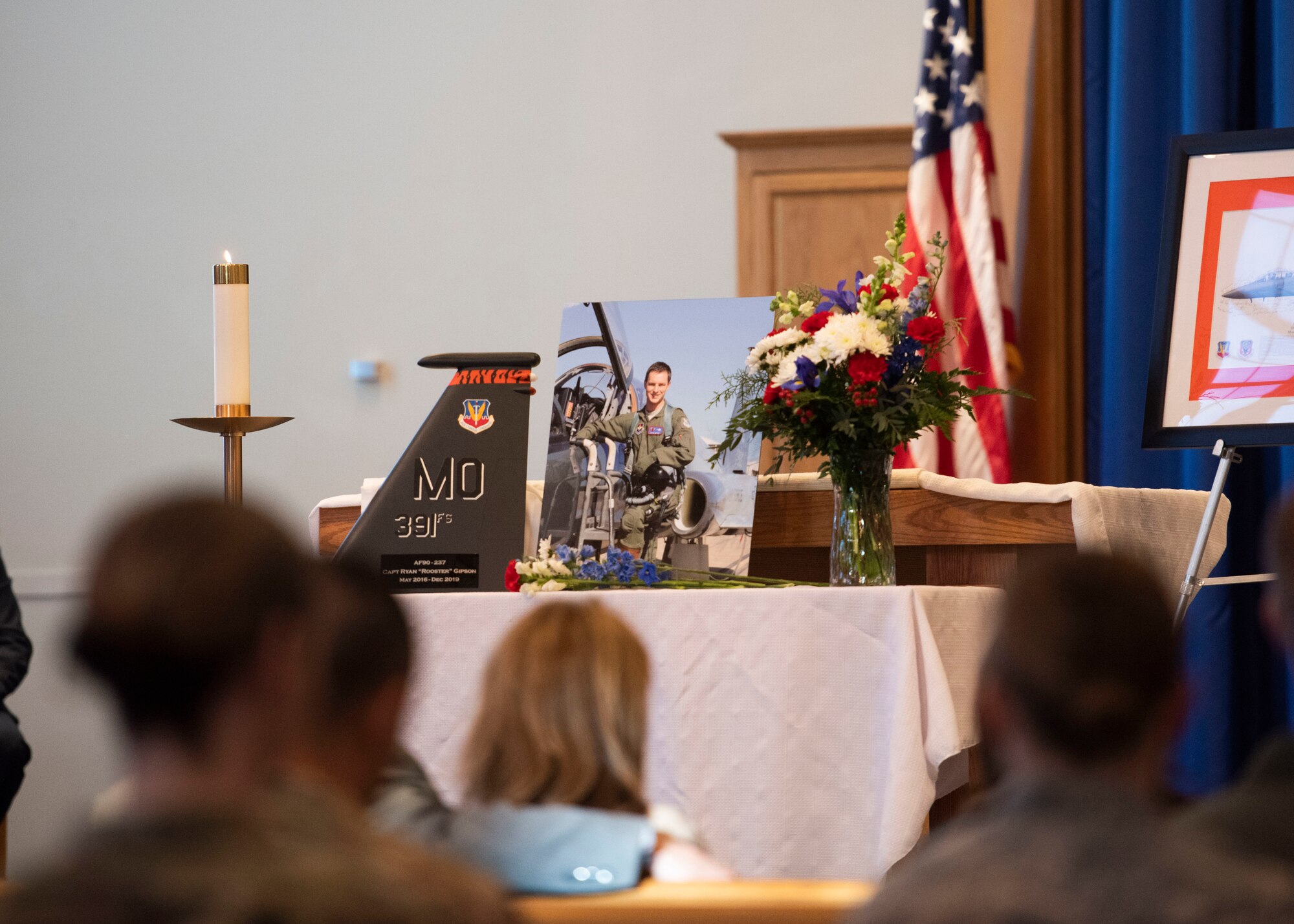 A table is set as a memorial for Capt. Ryan Gipson, 391st Fighter Squadron wing munitions manager, during his memorial ceremony,  Jan. 16, 2020, at Mountain Home Air Force Base, Idaho. This ceremony was held to celebrate the life of Capt. Ryan Gipson and his honorable years of service in the United States Air Force. (U.S. Air Force photo by Senior Airman Tyrell Hall)