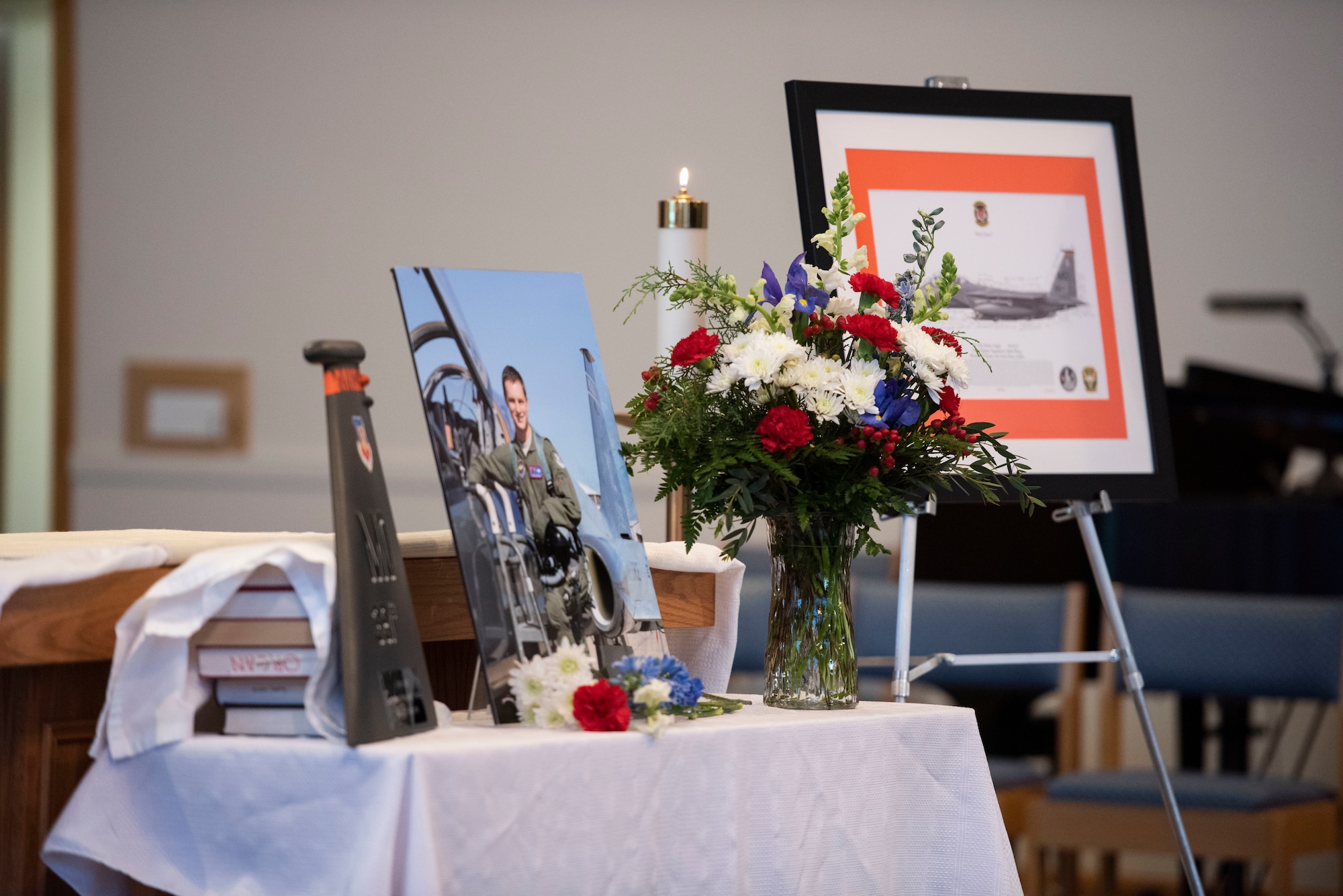 A table is set as a memorial for Capt. Ryan Gipson, 391st Fighter Squadron wing munitions manager, during his memorial ceremony,  Jan. 16, 2020, at Mountain Home Air Force Base, Idaho. This ceremony was held to celebrate the life of Capt. Ryan Gipson and his honorable years of service in the United States Air Force. (U.S. Air Force photo by Senior Airman Tyrell Hall)