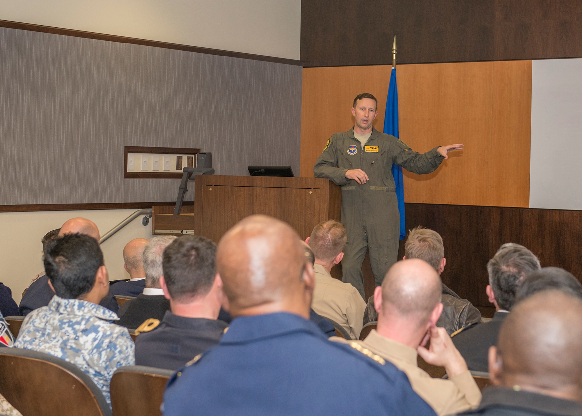 Lt. Col. Thomas Hayes, 61st Fighter Squadron commander, briefs students and staff from the Naval Command College on the F-35A Lightning II capabilities and training, Jan. 14, 2020, at Luke Air Force Base, Ariz.