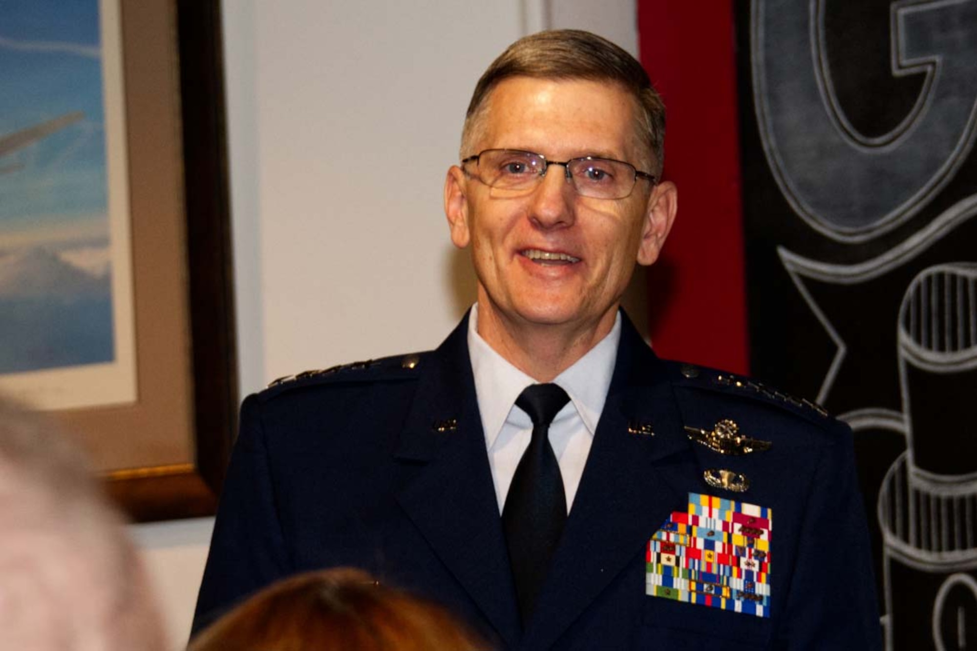 Photo of General Ray smiling.