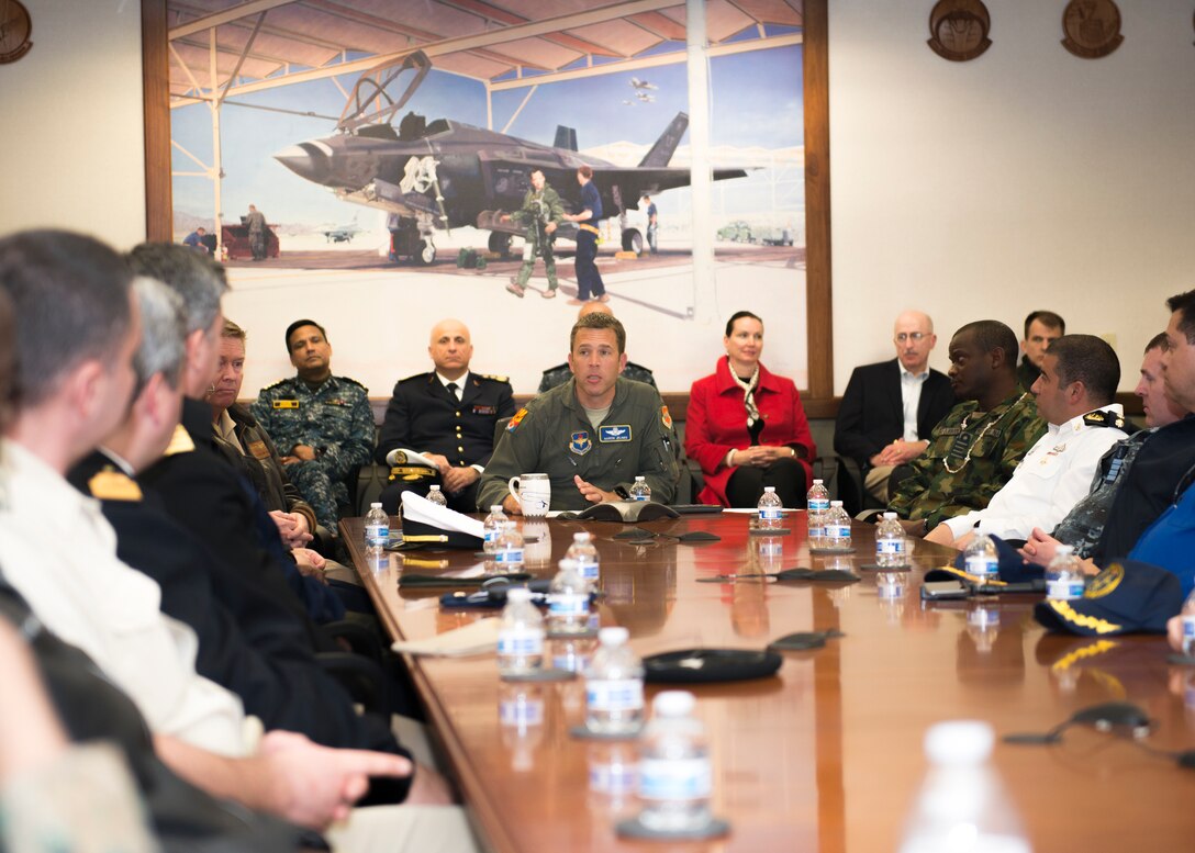 Lt. Col. Paul Jelinek, 56th Fighter Wing director of staff, engages with visitors from the Naval Command College, Jan. 14, 2020, at Luke Air Force Base, Ariz.