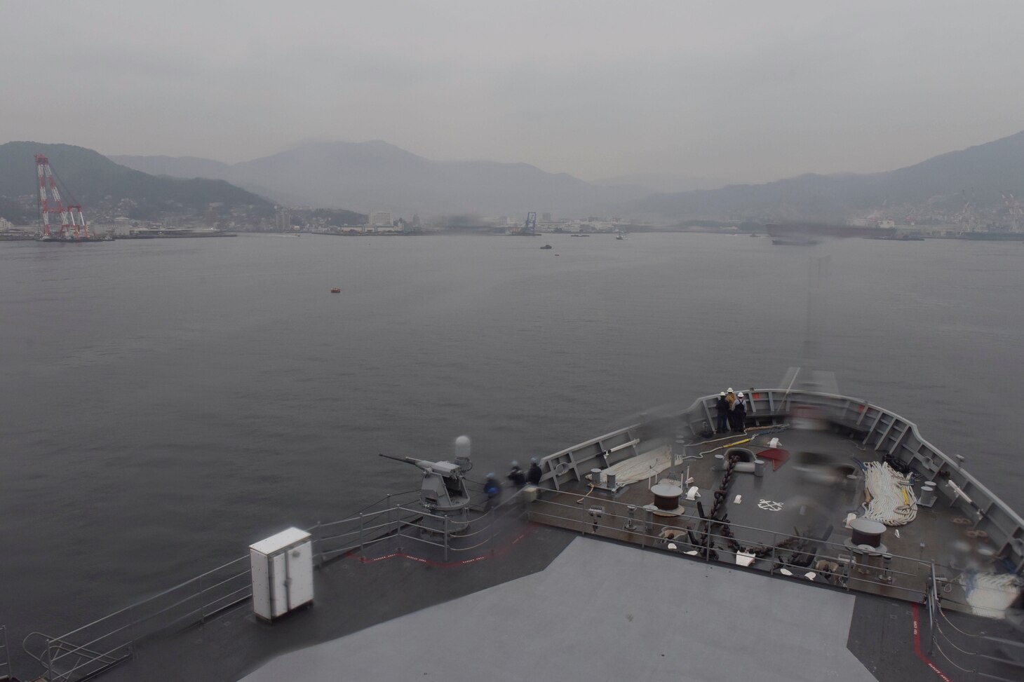 KURE, Japan (Jan. 22, 2020) - The submarine tender USS Emory S. Land (AS 39), prepares to moor in Kure, Japan, Jan. 22, for a scheduled port visit. Land is deployed to the U.S. 7th Fleet area of operations to support theater security cooperation efforts in the Asia-Pacific region.