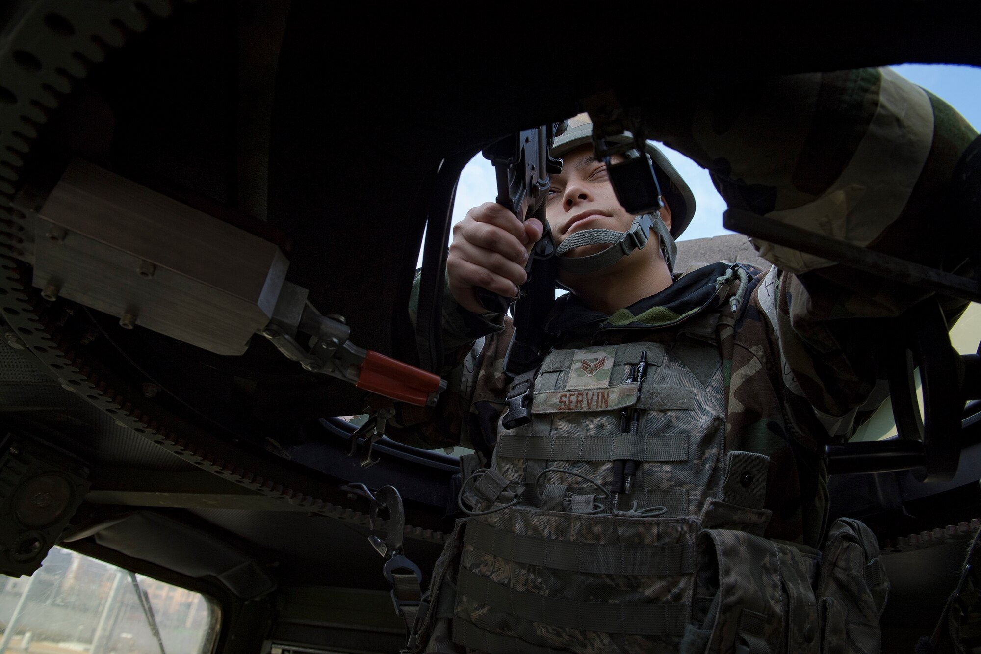 A 51st Security Forces Squadron defender scans the perimeter as part of a Combat Readiness Course, Dec. 16, 2019, at Osan Air Base, Republic of Korea. The course challenges Osan’s newest defenders on their readiness and skills to defend the base. (U.S. Air Force photo by Staff Sgt. Greg Nash)