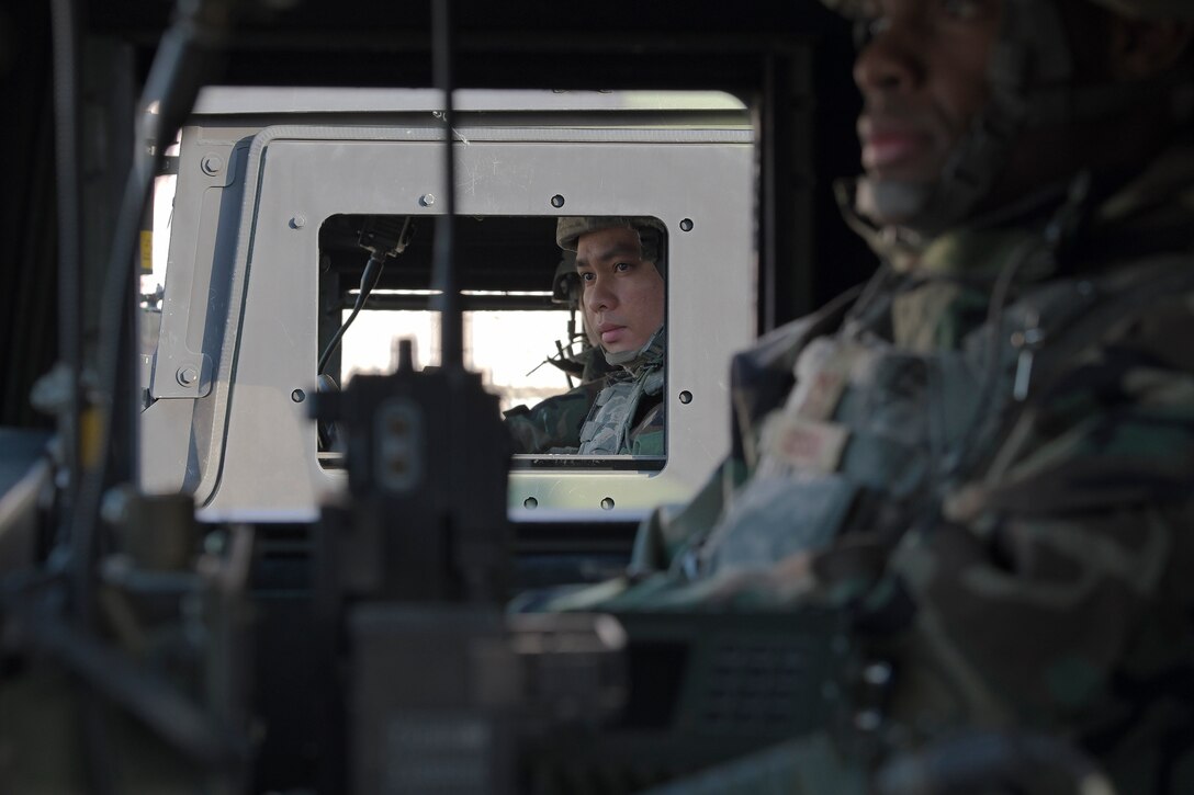 51st Security Forces Squadron defenders scan the perimeter from their Humvees during a Combat Readiness Course, Dec. 16, 2019, at Osan Air Base, Republic of Korea. The course challenges Osan’s newest defenders on their readiness and skills to defend the base. (U.S. Air Force photo by Staff Sgt. Greg Nash)