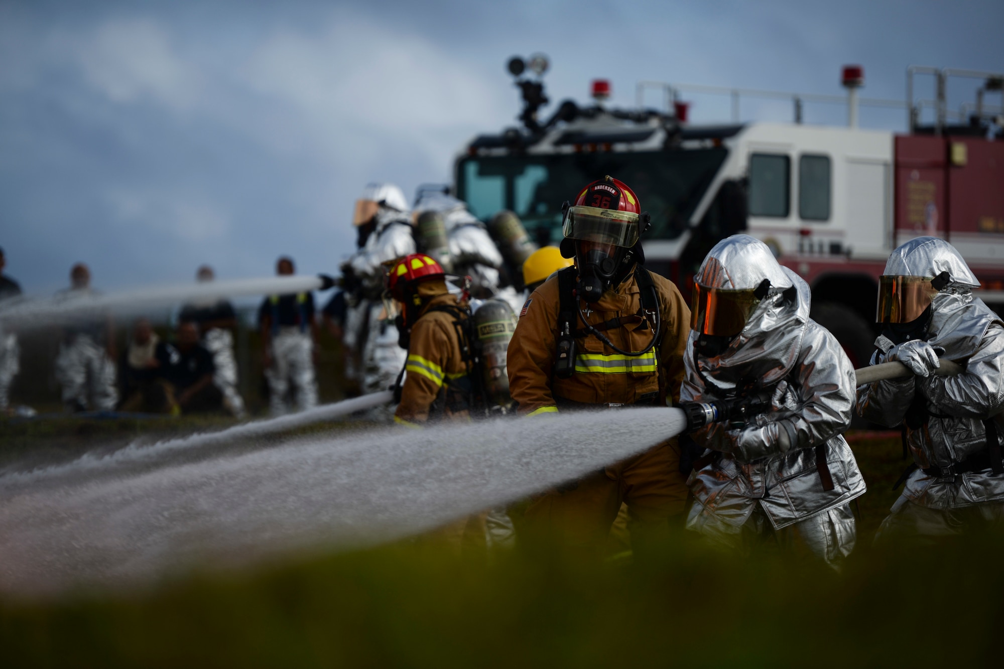 Firefighters from the Pacific Region participate in a live fire training burn, January 8, 2020, at Andersen Air Force Base, Guam.