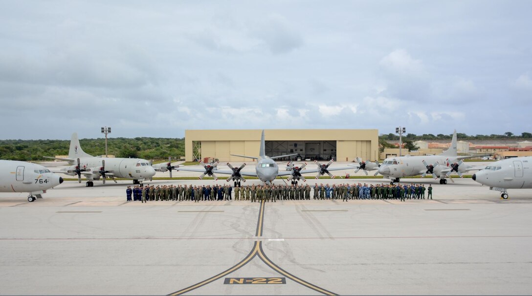 ANDERSEN AIR FORCE BASE (Jan. 21, 2020) Service members from the U.S Navy, Royal Australian Air Force (RAAF), Japan Maritime Self Defense Force (JMSDF), the Republic of Korea navy (ROKN) and the Royal New Zealand navy (RNZN) for a photo during operation SEA DRAGON 2020, Jan. 21. SEA DRAGON is a multi-lateral Anti-Submarine Warfare exercise that improves the interoperability elements required to effectively and cohesively respond to the defense of a regional contingency in the Indo-Asia-Pacific, while continuing to build and strengthen relationships held between nations.