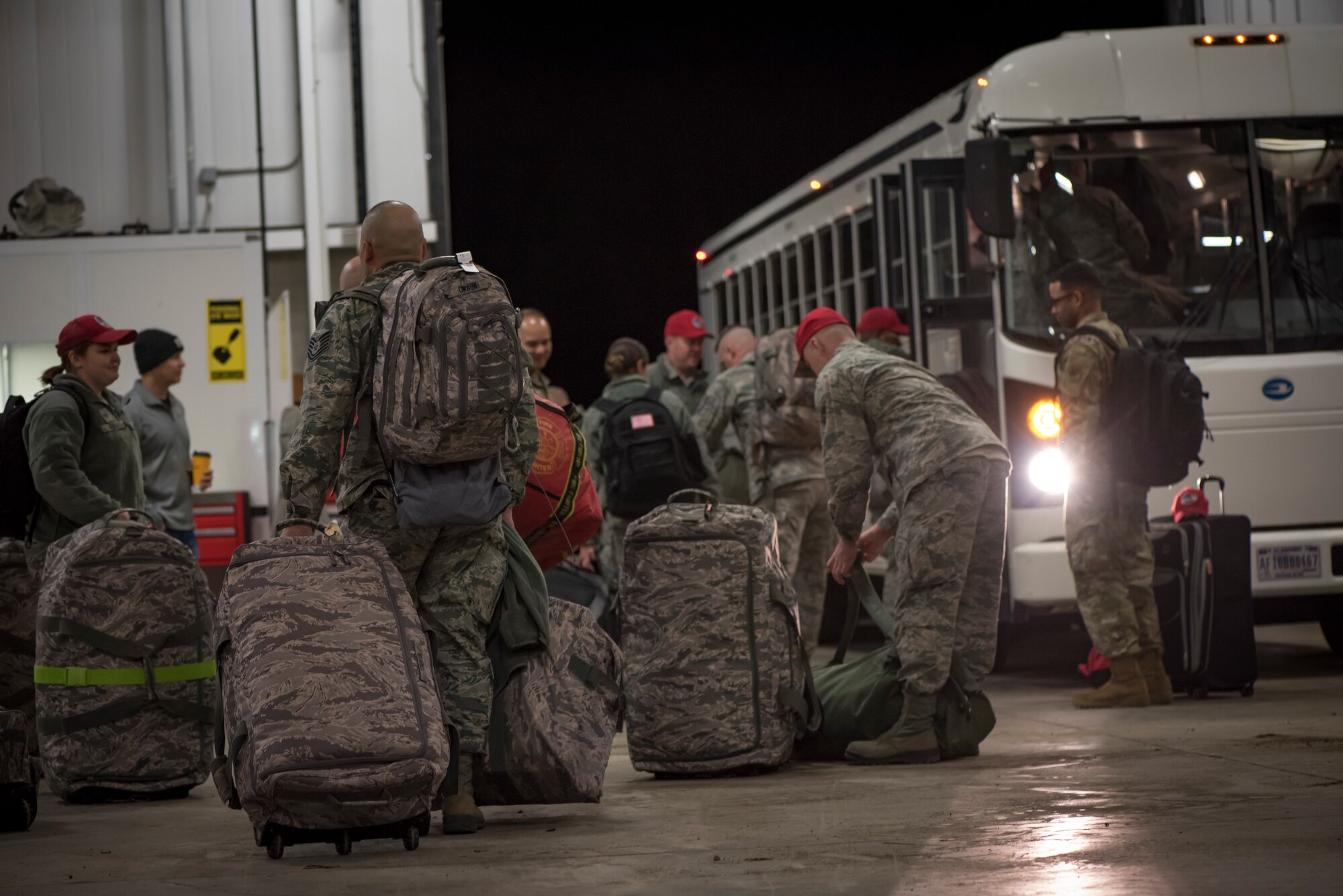 U.S. Air Force Airmen, assigned to the 200th RED HORSE Squadron, Ohio Air National Guard, depart for Puerto Rico following activation in response to earthquake disaster relief efforts, Jan. 17, 2020. Along with personnel, the Ohio National Guard unit contributed two Disaster Response Bed-down Systems, each with the ability to provide organic power and potable water systems for billeting, health and hygiene support for up to 150 people. (U.S. Air National Guard photo by Tech. Sgt. Joe Harwood)