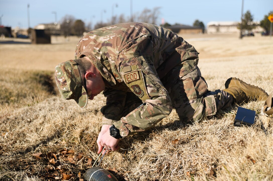 Staff Sgt. Kaanen Brabbs, 22nd Civil Engineering Squadron explosive ordnance technician, measures an unidentified explosive ordnance during upgrade training Jan. 9, 2020, at McConnell Air Force Base, Kansas.  McConnell’s EOD flight is responsible for providing rapid response capabilities to nine core mission areas. (U.S. Air Force photo by Airman 1st Class Nilsa E. Garcia)