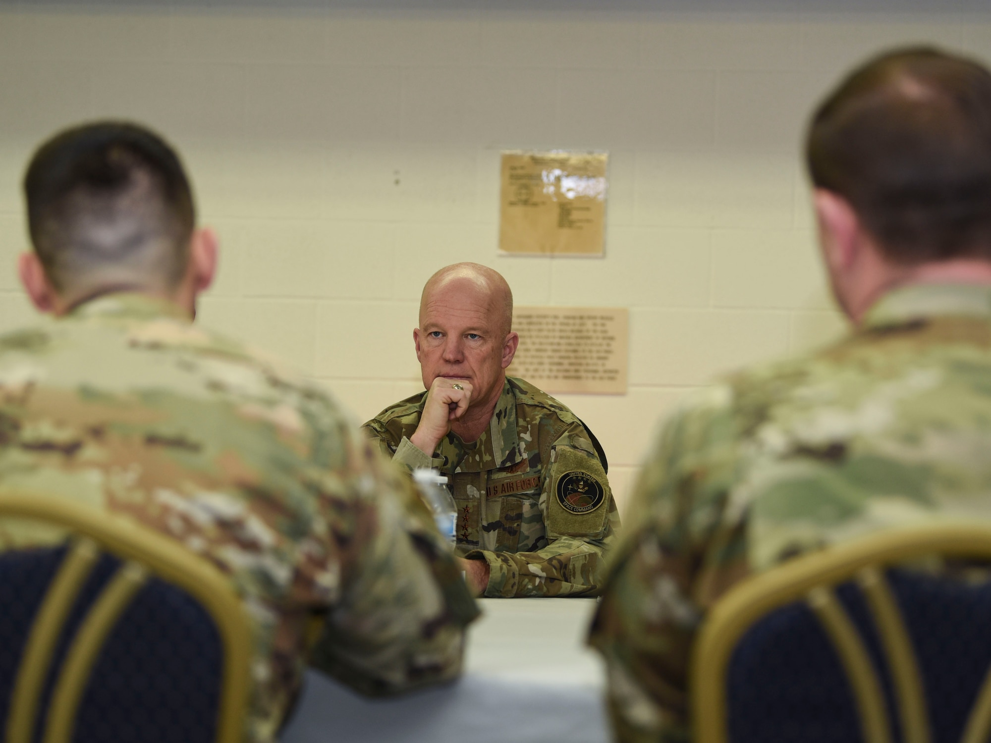 General John Raymond, U.S. Space Force chief of space operations, sits down for a conference discussing base functionality and Airmen readiness Jan. 10, 2020, on Cavalier Air Force Station, North Dakota. Cavalier commanders expressed their appreciation for Raymond’s visit, and gave him insight on the current status of the station in functionality and readiness. (U.S. Air Force photo by Senior Airman Melody Howley)