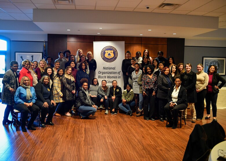 Participants in the Women Defenders Symposium pose for a picture during the event held in Philadelphia, Pennsylvania on Jan. 17. Members from Joint Base McGuire-Dix-Lakehurst, New Jersey, Philadelphia Police Department, United States Secret Service and the Bureau of Alcohol, Tobacco, Firearms and Explosives gathered to build relationships and share experiences between the counterparts while discussing gender differences in a male dominated career fields.