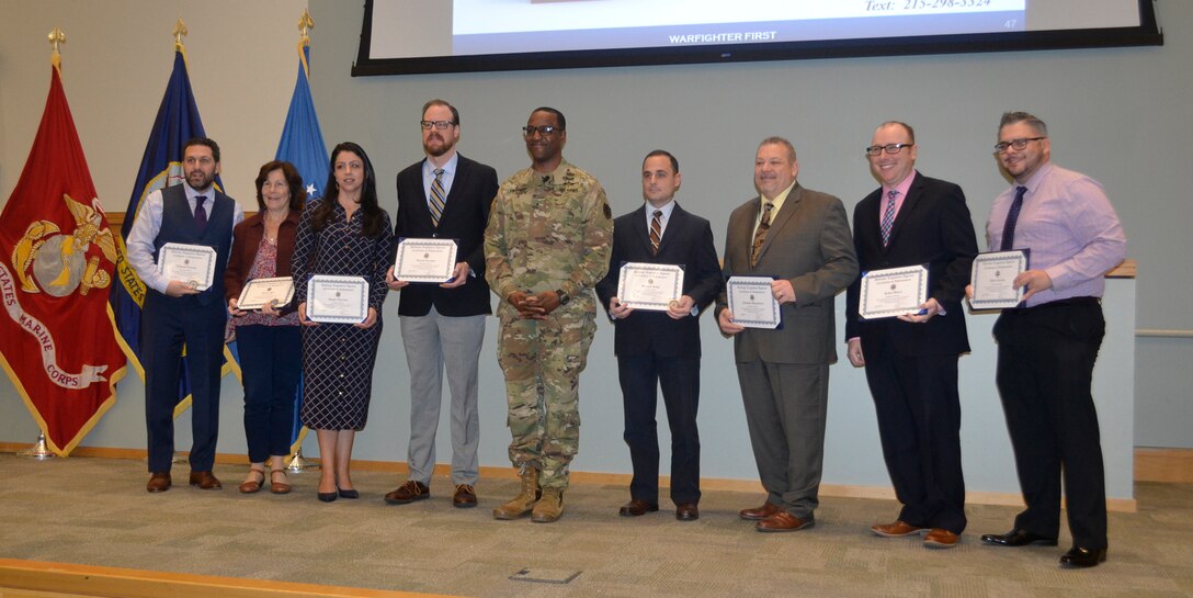 DLA Troop Support employees receive awards.