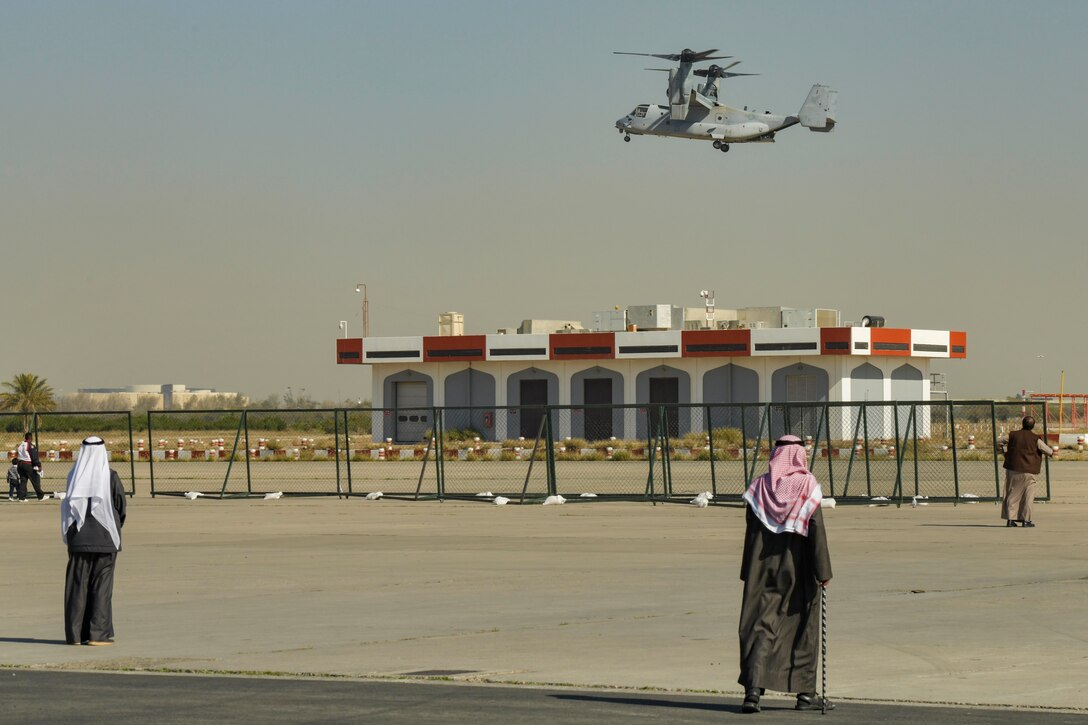 A U.S. Marine Corps MV-22 Osprey conducts a demonstration during the 2020 Kuwait Aviation Show at the Kuwait International Airport, Farwaniya, Kuwait, Jan. 17, 2020. This marks the first year that Kuwait has hosted U.S. military aircraft for flyovers at the event. Other participating U.S. aircraft included the U.S. Air Force F-35A Lightning II. Events like the KAS strengthen the U.S.’s military-to-military relationships with regional partners. (U.S. Air Force photo by Tech. Sgt. Alexandre Montes)